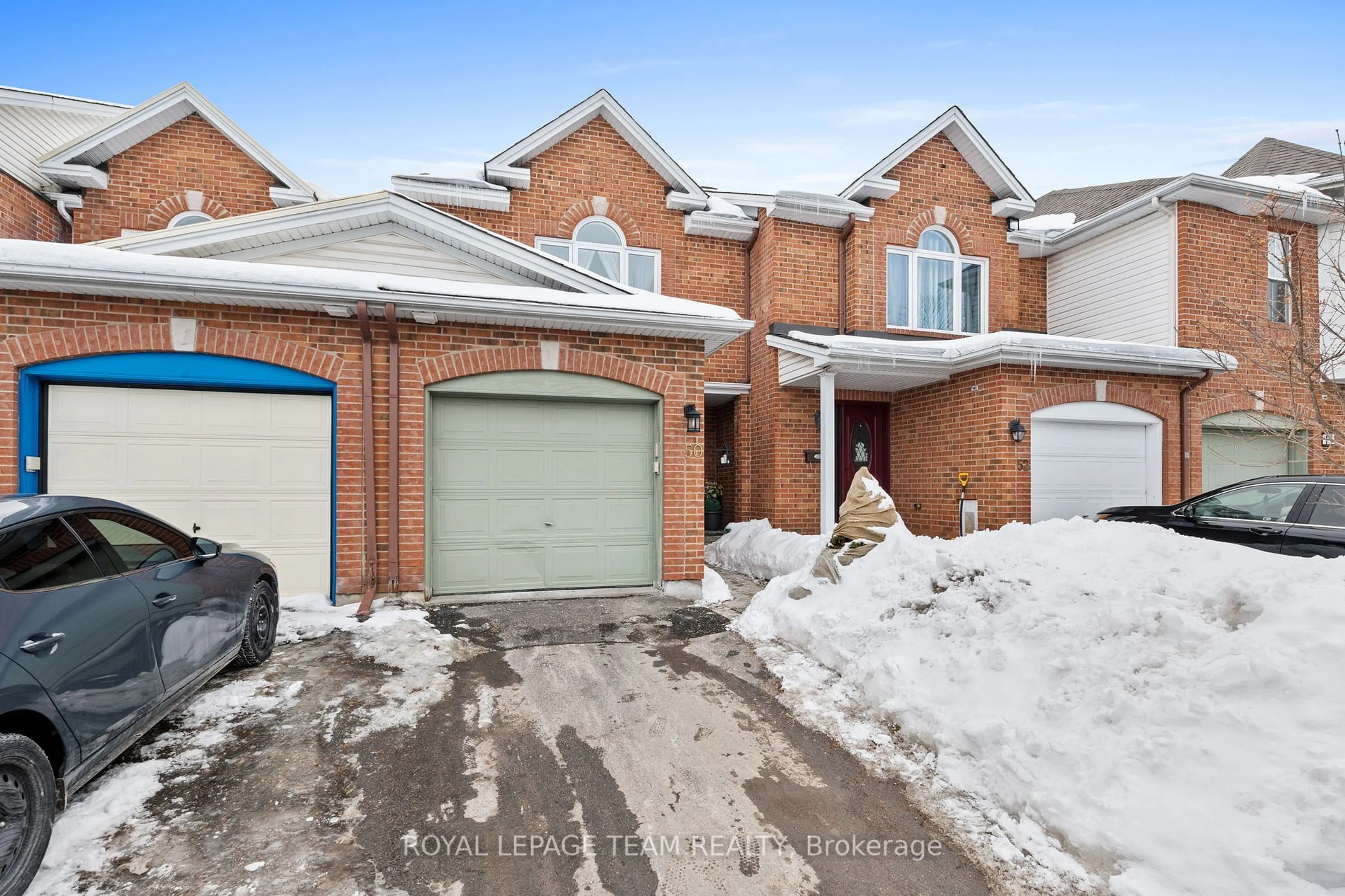 Home with brick exterior material, street for 50 Coralbell Private, Hunt Club - South Keys and Area Ontario K1T 3Z8