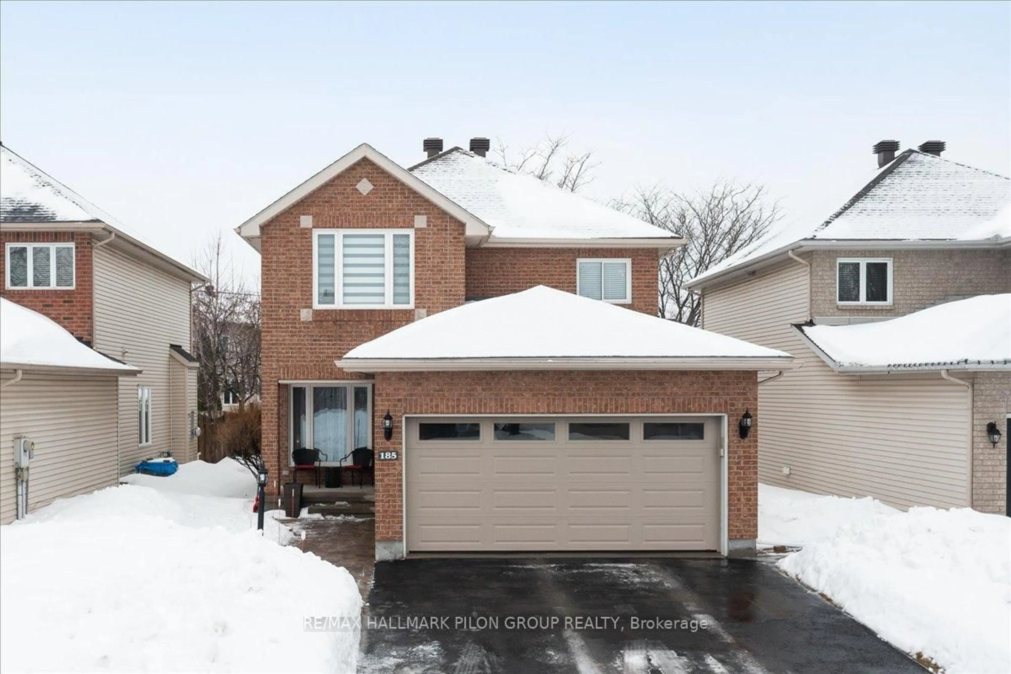 Home with brick exterior material, street for 185 Redpath Dr, Barrhaven Ontario K2G 6K5