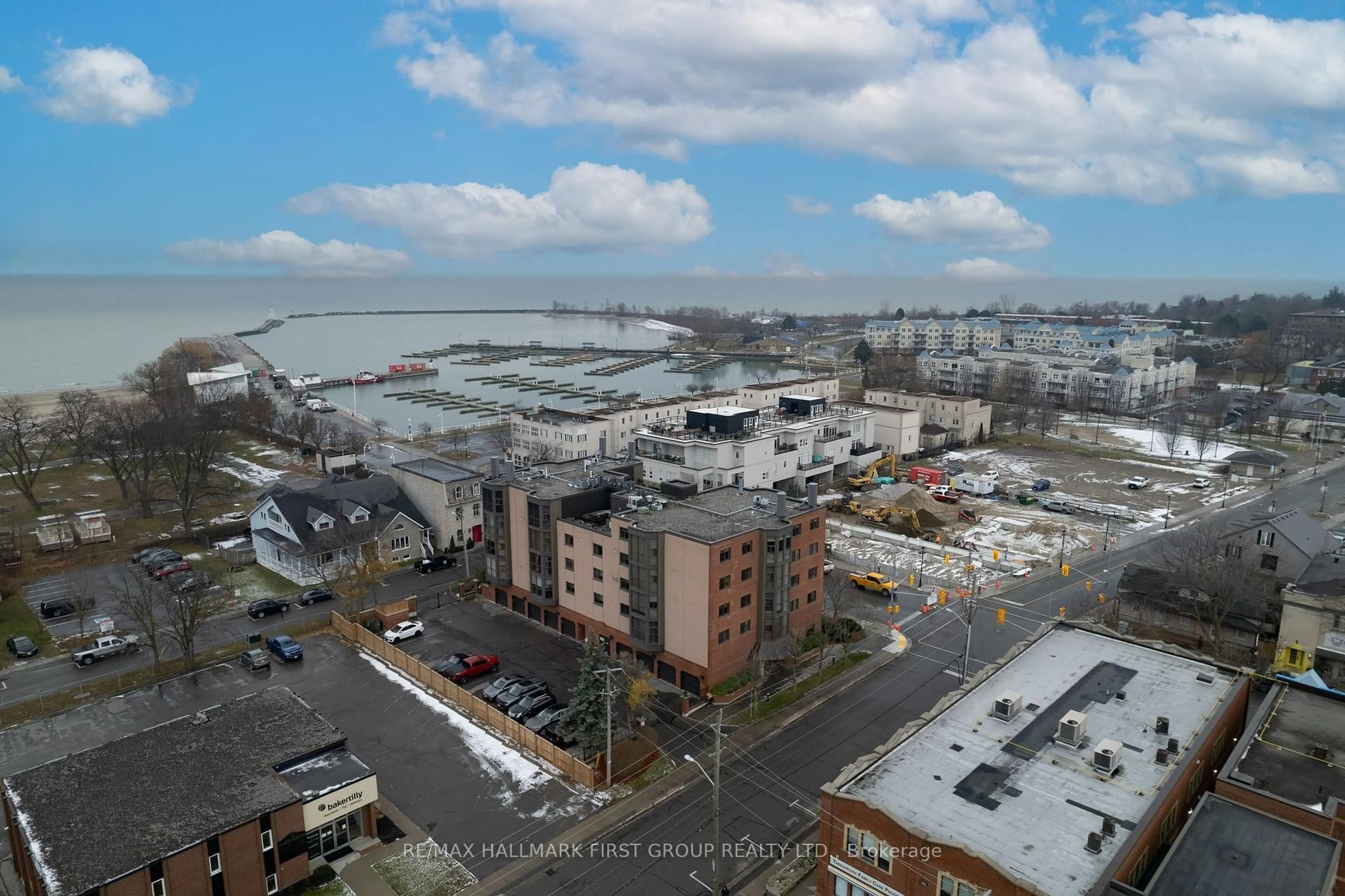 A pic from outside/outdoor area/front of a property/back of a property/a pic from drone, city buildings view from balcony for 1 Queen St #404, Cobourg Ontario K9A 1M8