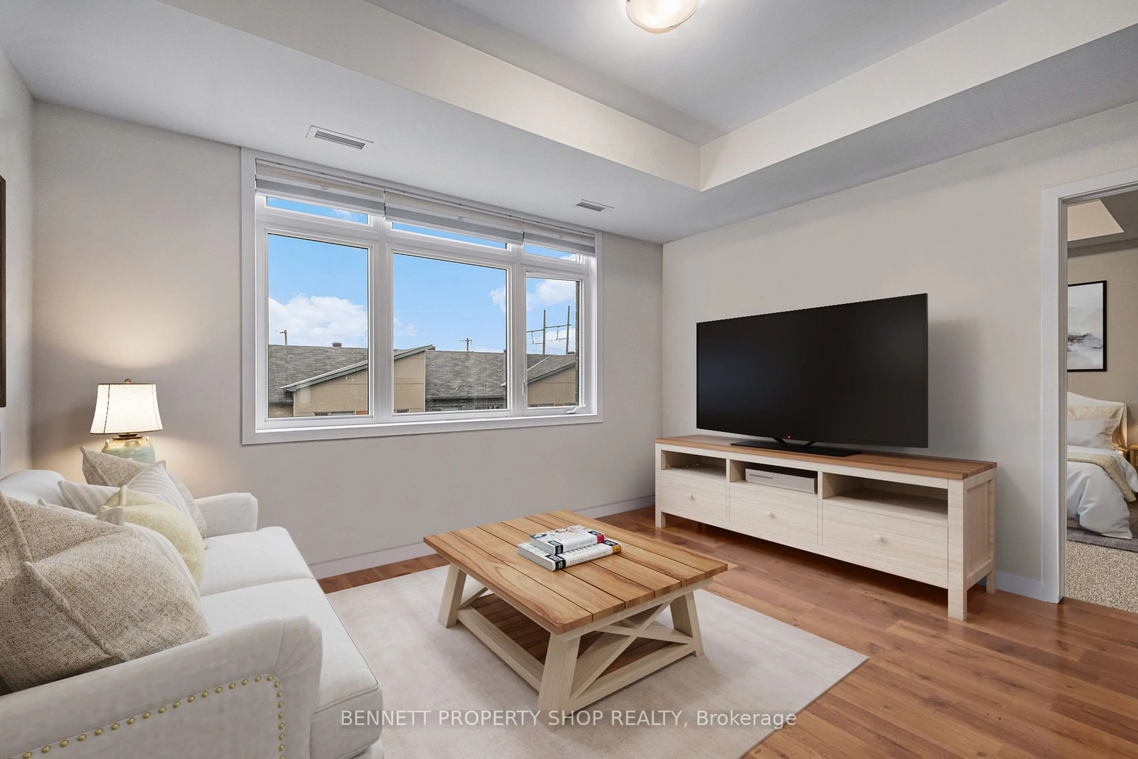 Living room with furniture, wood/laminate floor for 315 Terravita #308, Hunt Club - Windsor Park Village and Area Ontario K1V 2S1