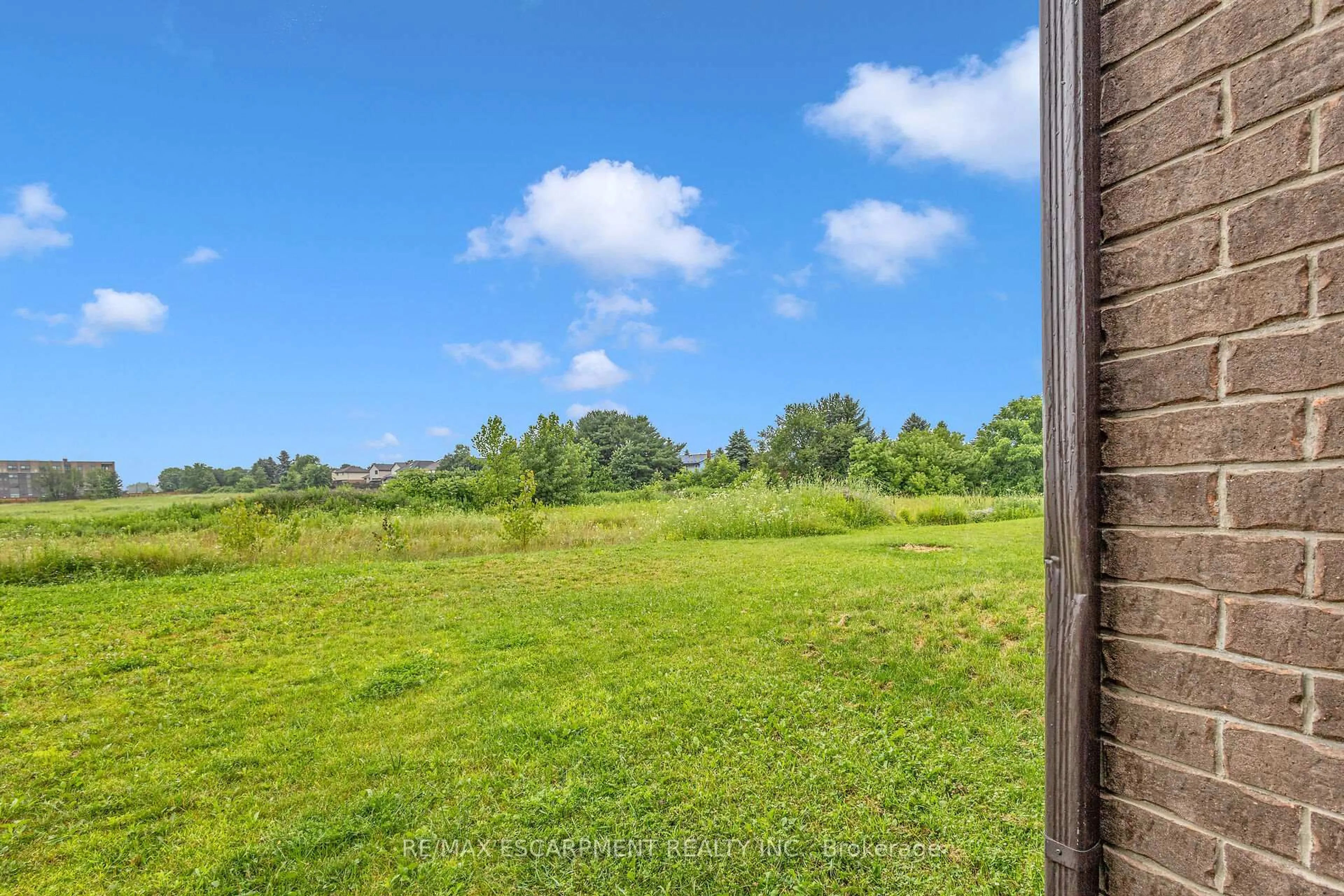 A pic from outside/outdoor area/front of a property/back of a property/a pic from drone, water/lake/river/ocean view for 1318 Caen Ave, Woodstock Ontario N4T 0J5