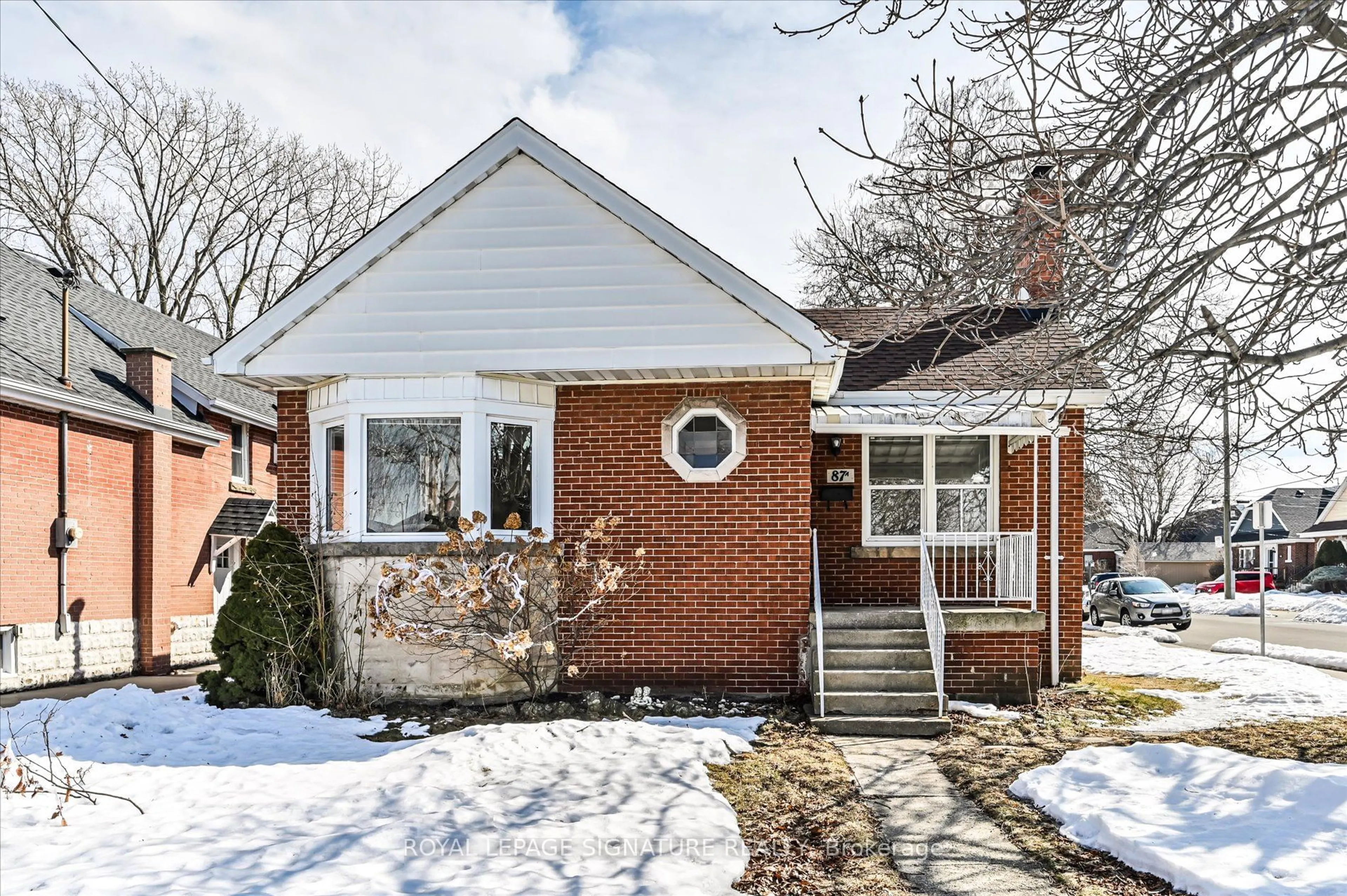 Home with brick exterior material, street for 87A Barons Ave, Hamilton Ontario L8K 2Y4