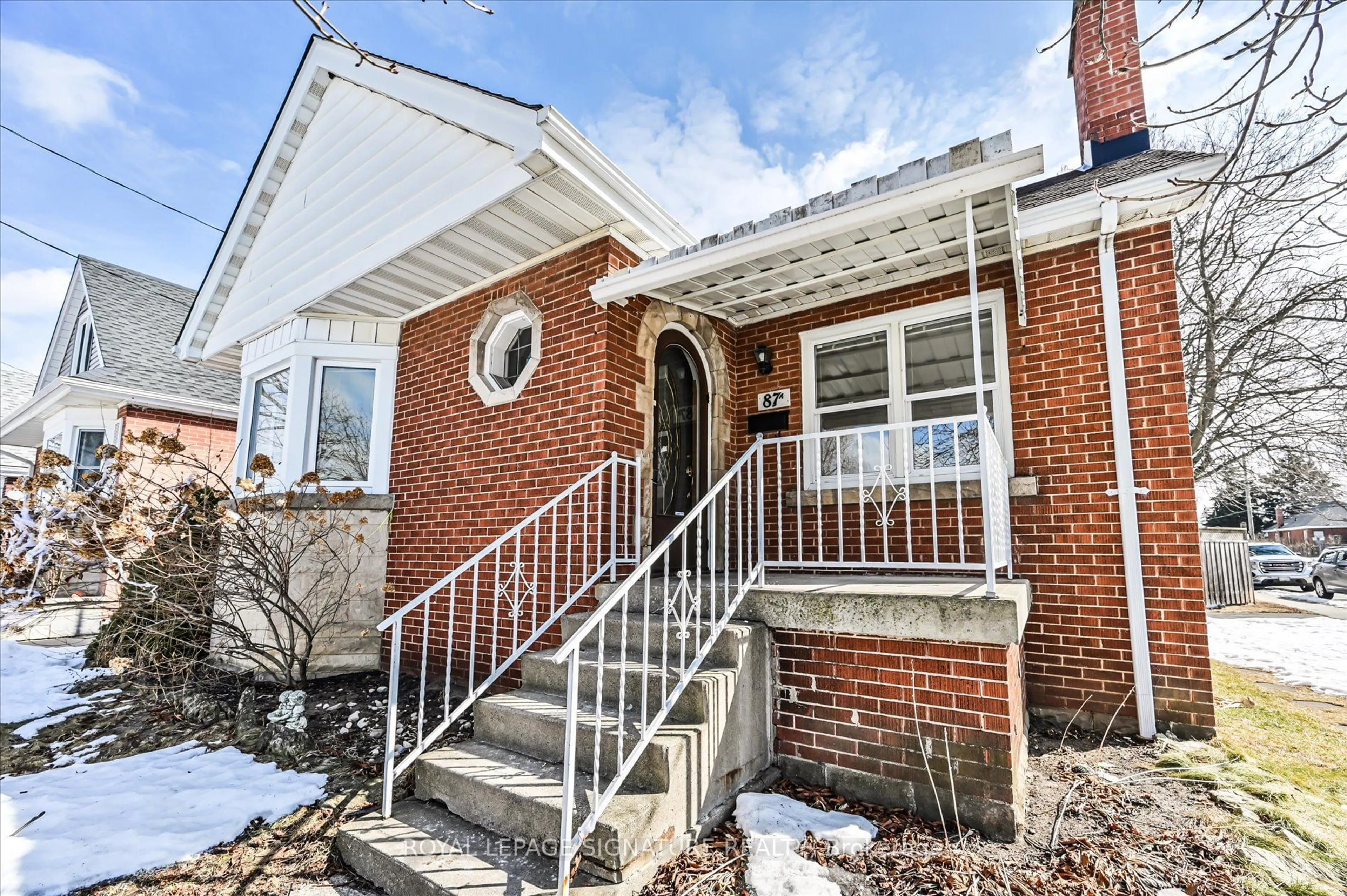 Home with brick exterior material, street for 87A Barons Ave, Hamilton Ontario L8K 2Y4