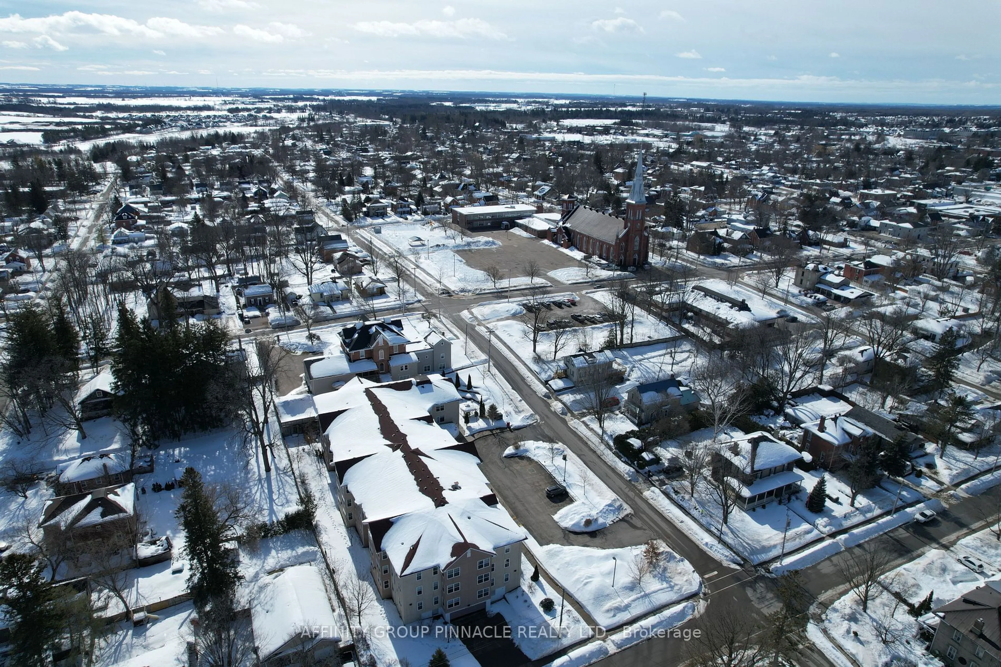 A pic from outside/outdoor area/front of a property/back of a property/a pic from drone, street for 8 Huron St #211, Kawartha Lakes Ontario K9V 6K8