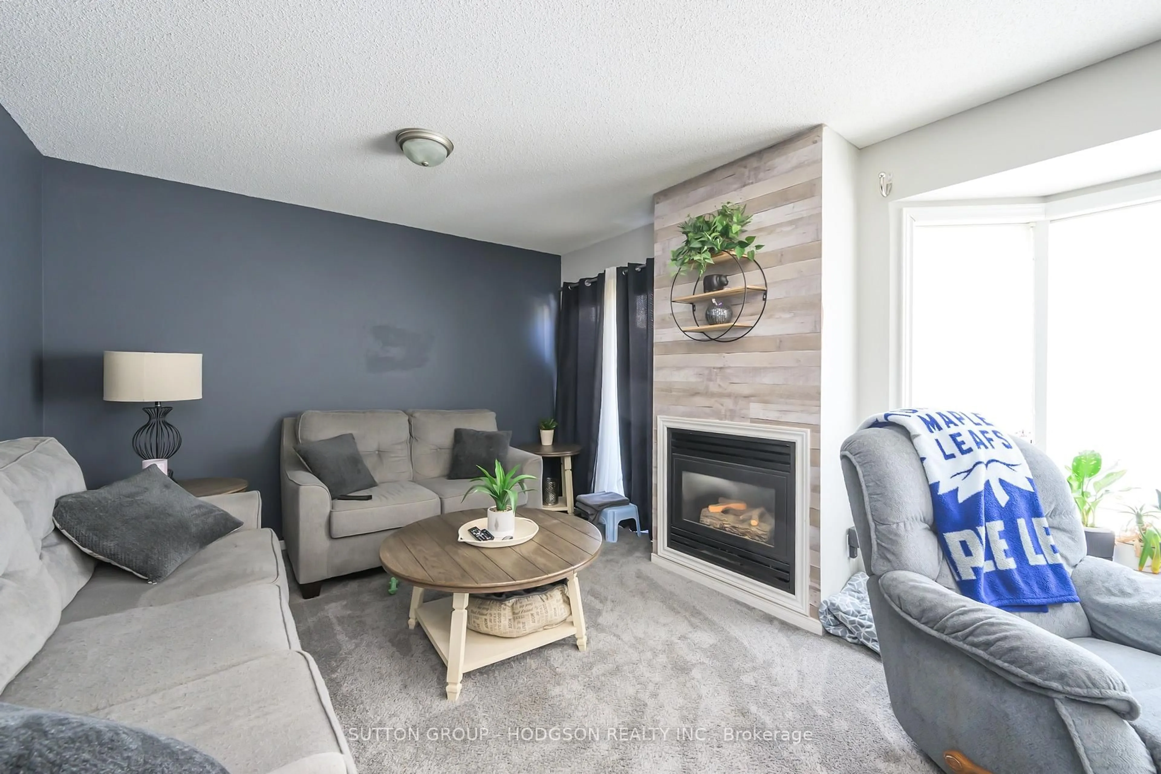 Living room with furniture, wood/laminate floor for 9 Ailsa Pl #43, London Ontario N5Z 4Z6