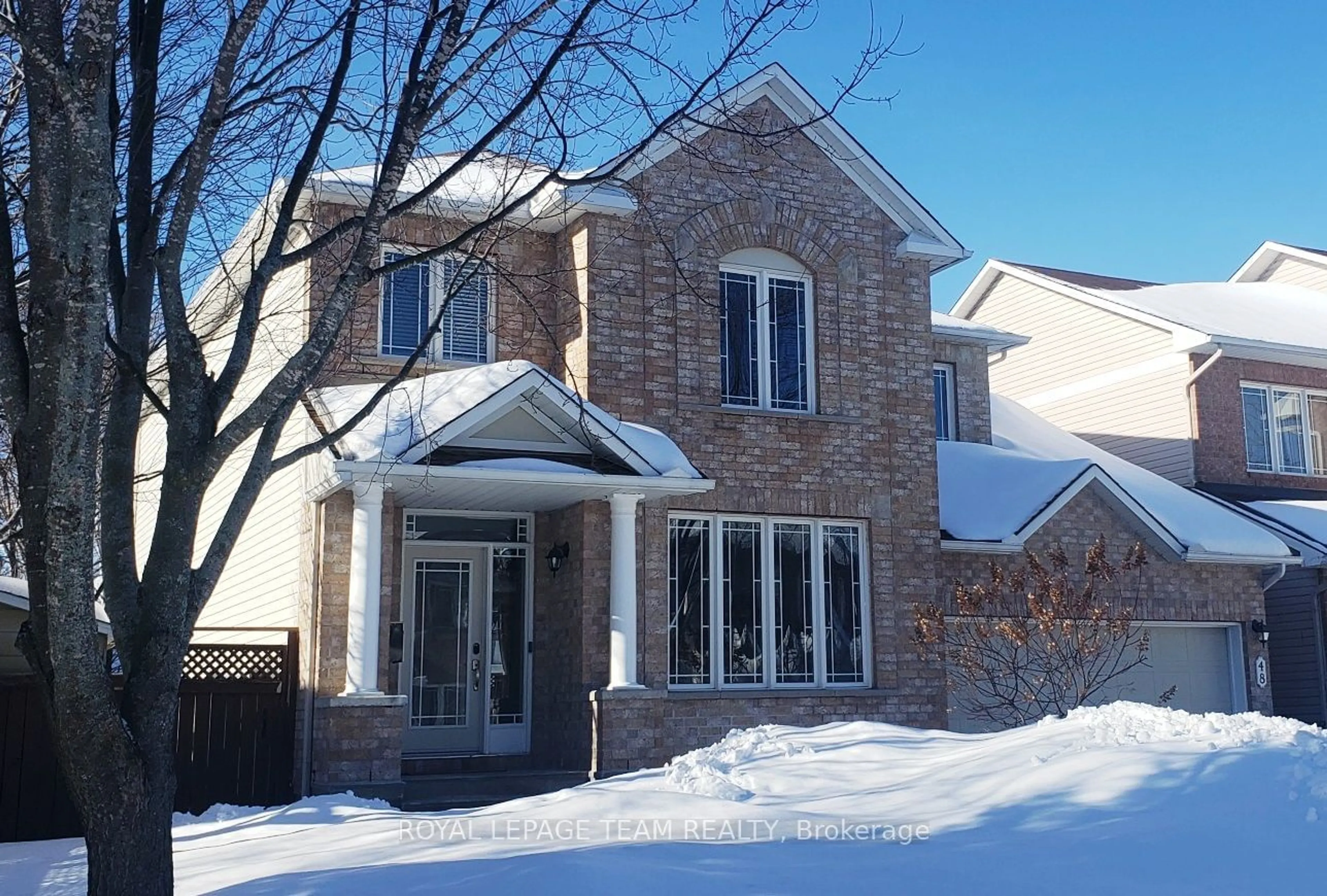 Home with brick exterior material, street for 48 Portadown Cres, Kanata Ontario K2W 1E8