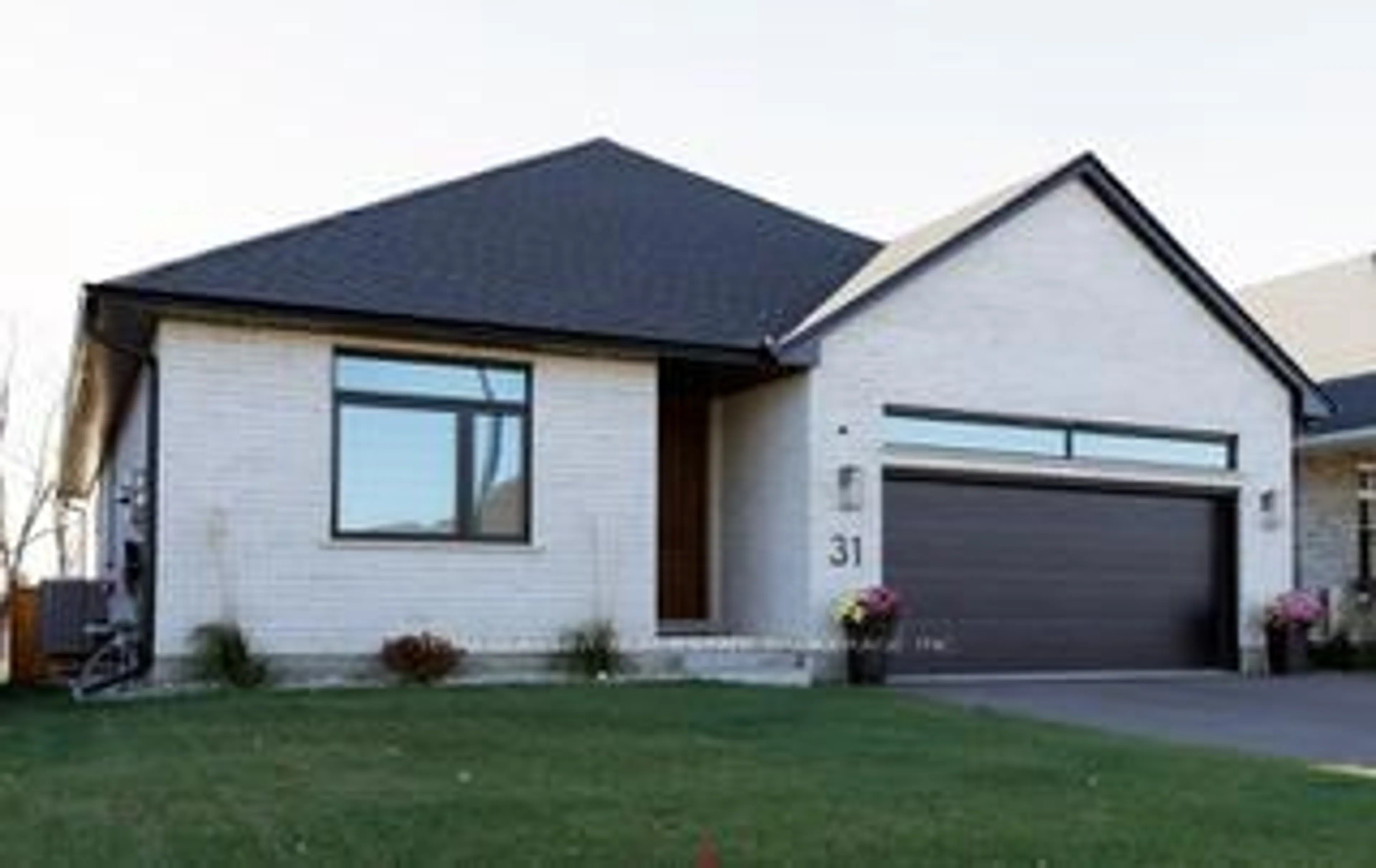 Home with vinyl exterior material, street for 31 Royal Dornoch Dr, St. Thomas Ontario N5R 0K4