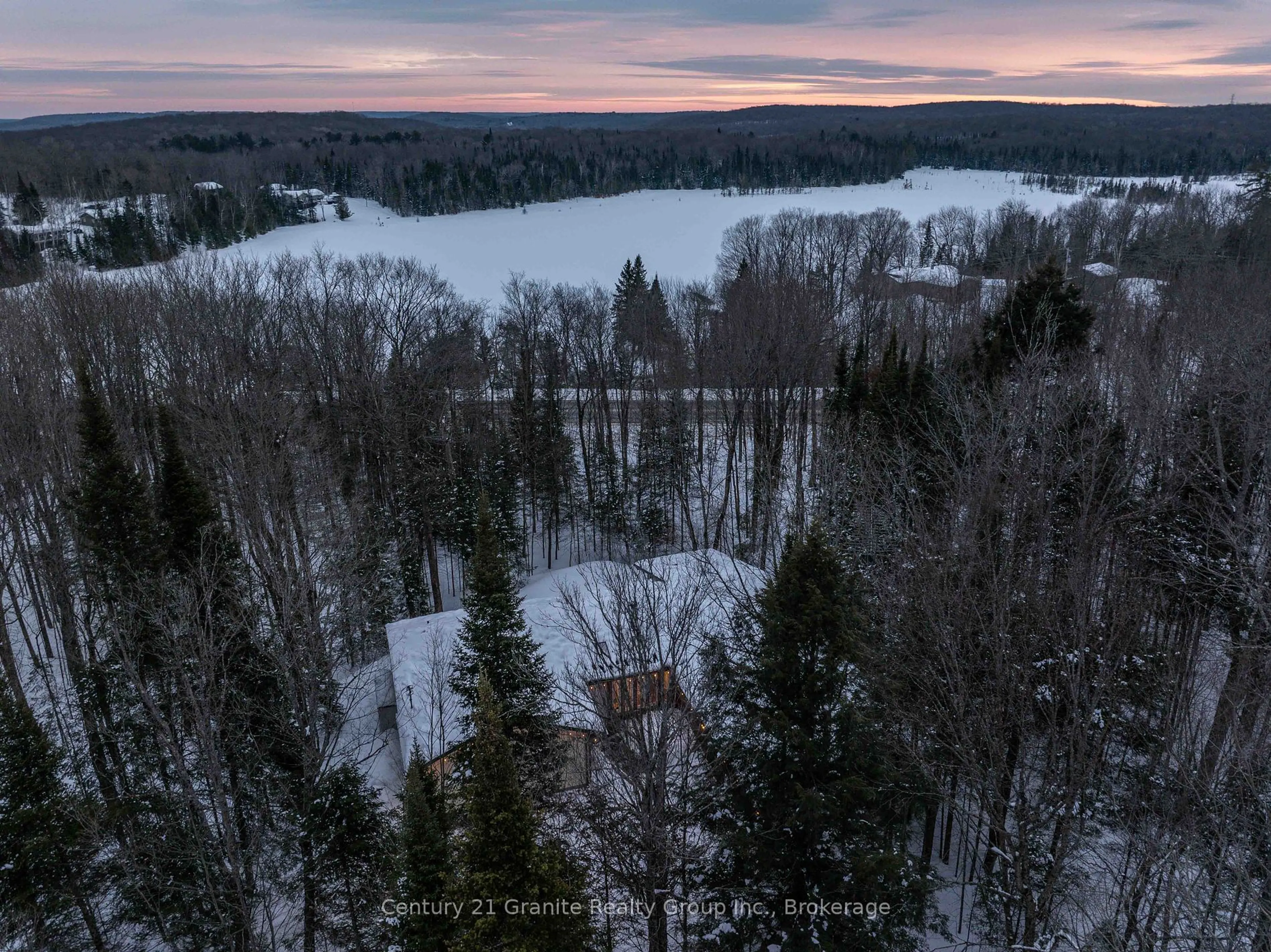 A pic from outside/outdoor area/front of a property/back of a property/a pic from drone, forest/trees view for 1051 Amaleen Dr, Dysart et al Ontario K0M 1S0