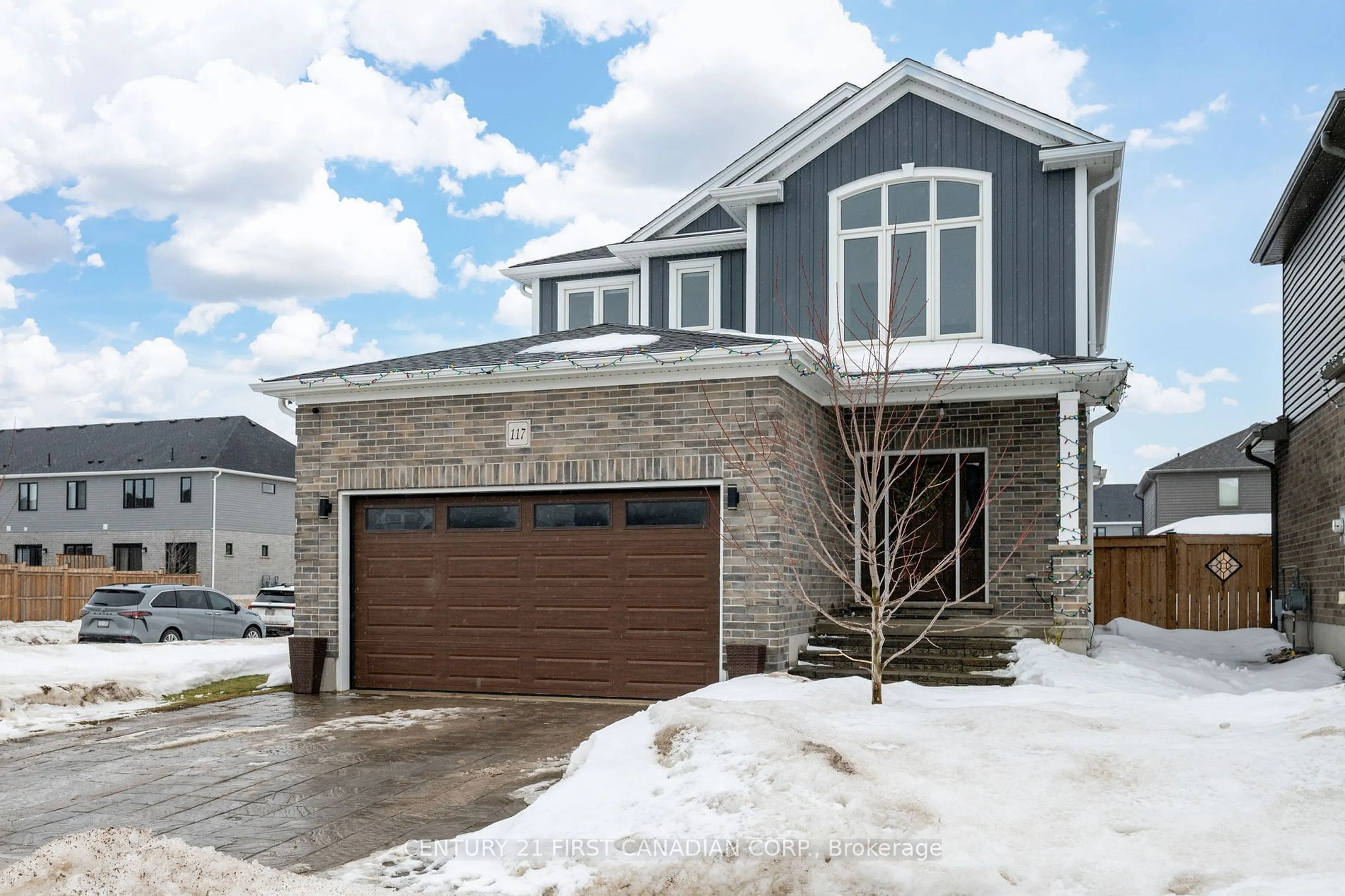 Home with brick exterior material, street for 117 Gilmour Dr, Lucan Biddulph Ontario N0M 2J0