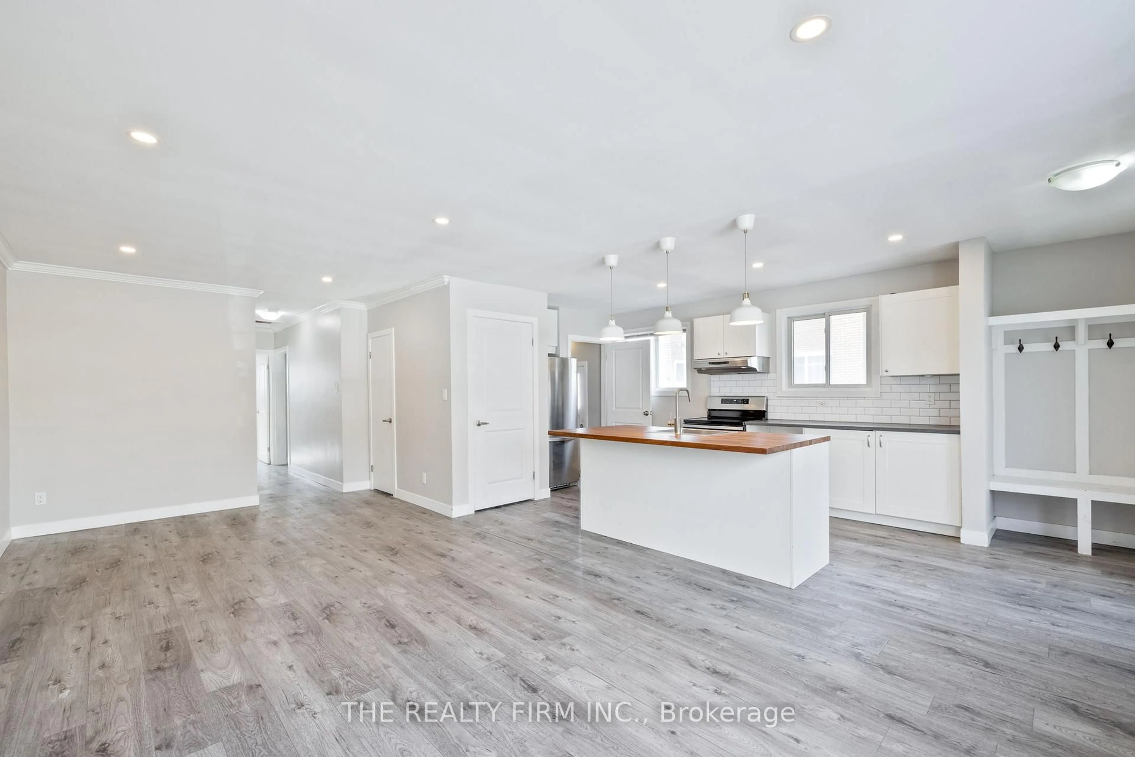 Open concept kitchen, wood/laminate floor for 203 Cairn St, London Ontario N5Z 3W6