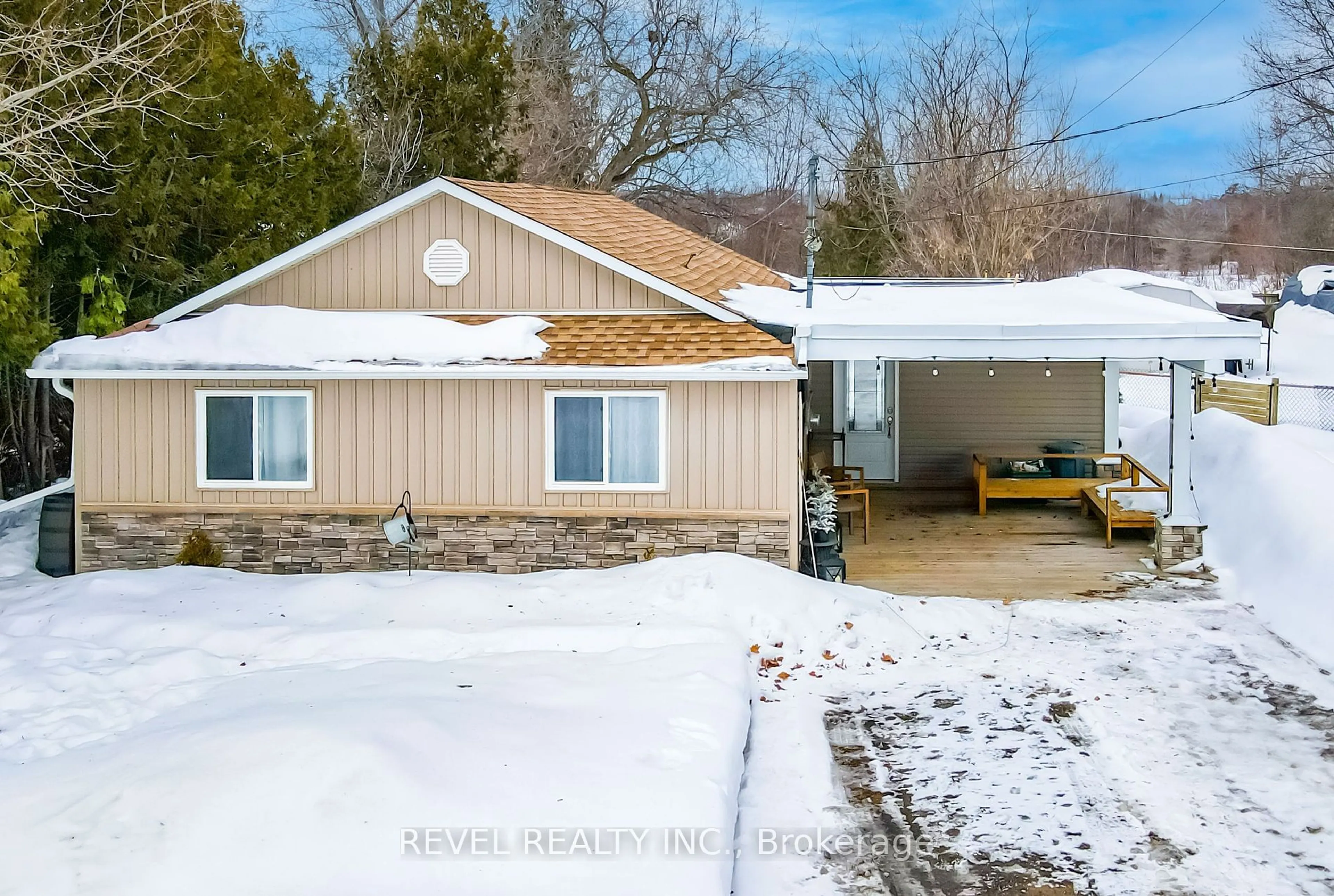 A pic from outside/outdoor area/front of a property/back of a property/a pic from drone, unknown for 411 LONG BEACH Rd, Kawartha Lakes Ontario K0M 1G0