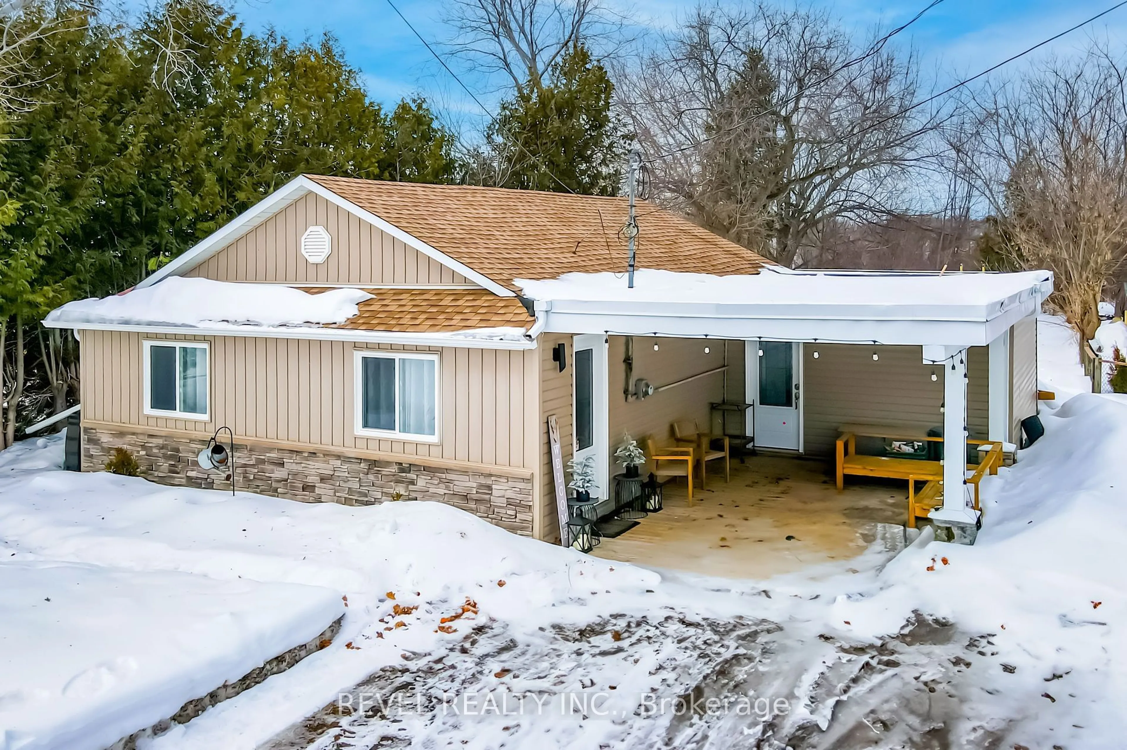 A pic from outside/outdoor area/front of a property/back of a property/a pic from drone, unknown for 411 LONG BEACH Rd, Kawartha Lakes Ontario K0M 1G0