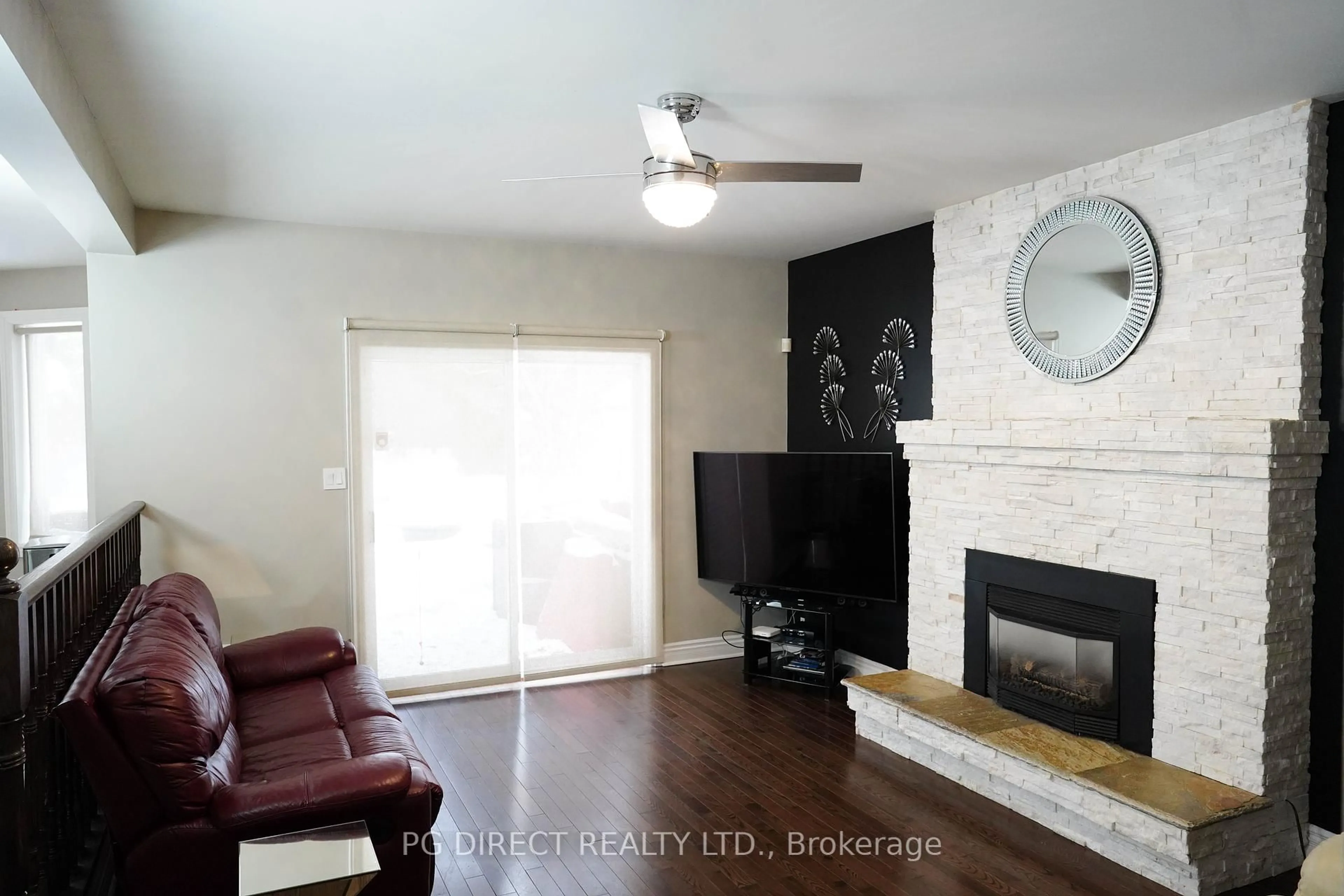 Living room with furniture, wood/laminate floor for 117 Miller Dr, Hamilton Ontario L9G 4W2