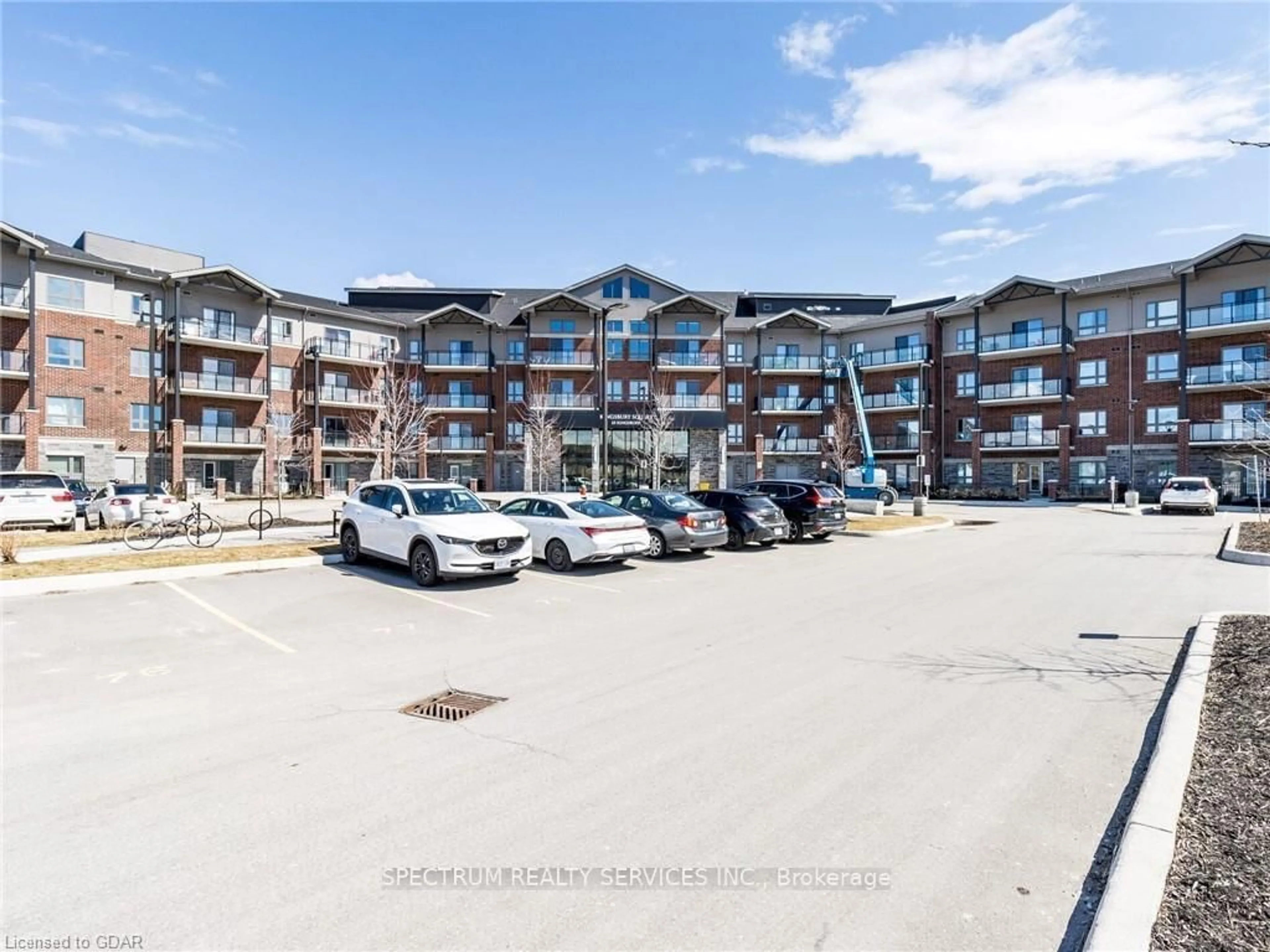 A pic from outside/outdoor area/front of a property/back of a property/a pic from drone, unknown for 35 Kingsbury Sq #327, Guelph Ontario N1L 0J4