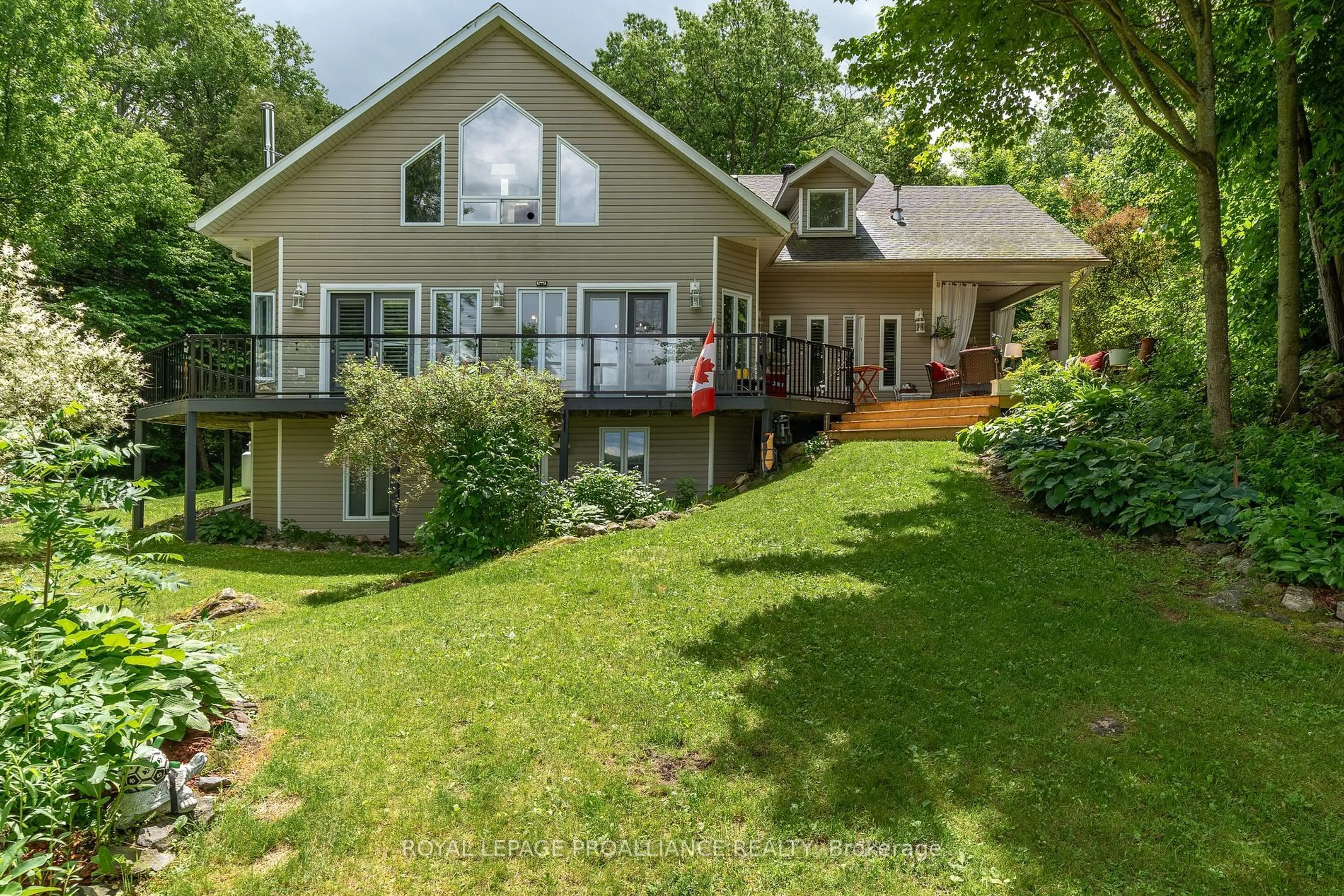 A pic from outside/outdoor area/front of a property/back of a property/a pic from drone, water/lake/river/ocean view for 17B Hughes Lane, Tweed Ontario K0K 3J0