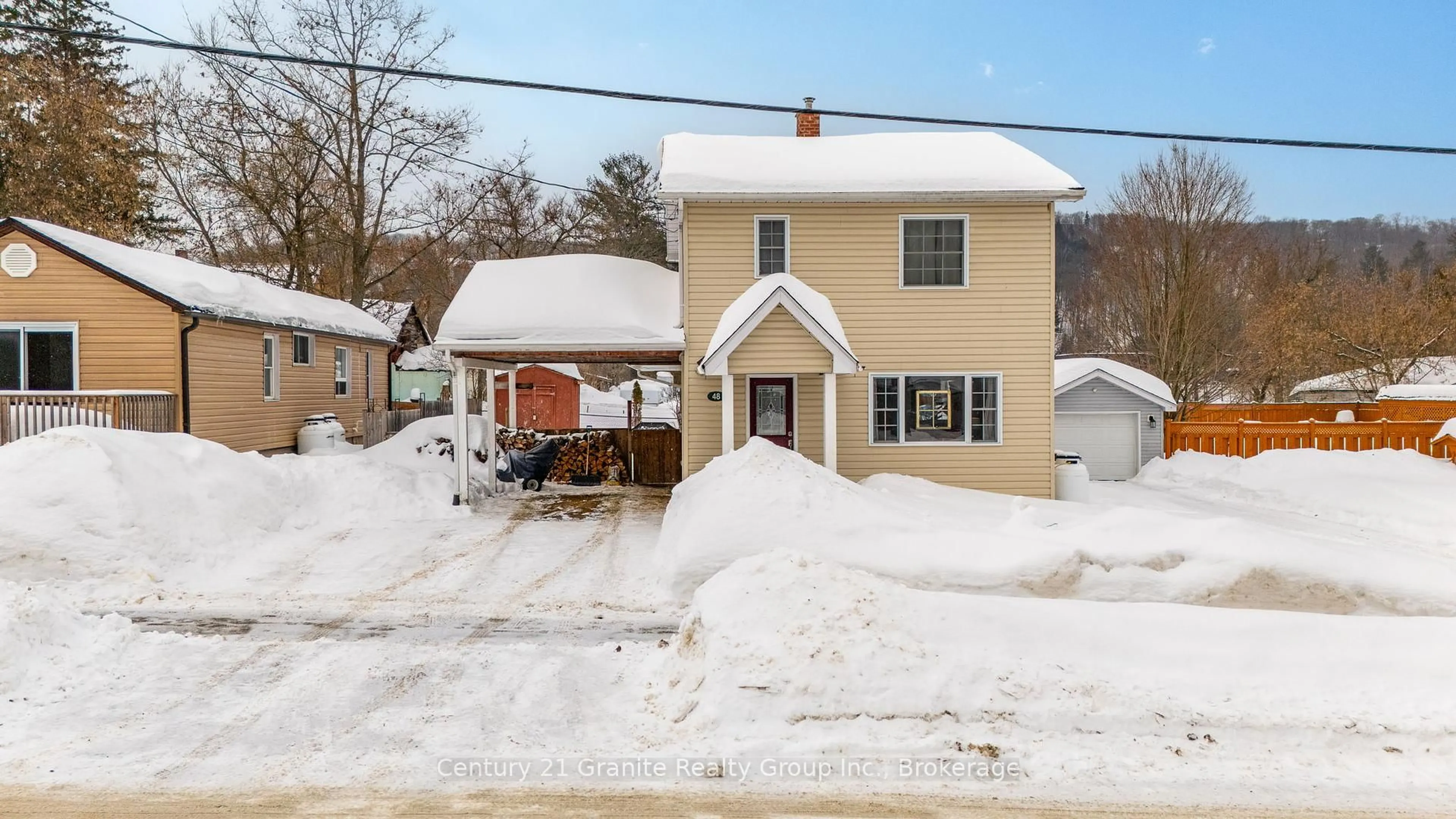 A pic from outside/outdoor area/front of a property/back of a property/a pic from drone, street for 48 Victoria St, Dysart et al Ontario K0M 1S0