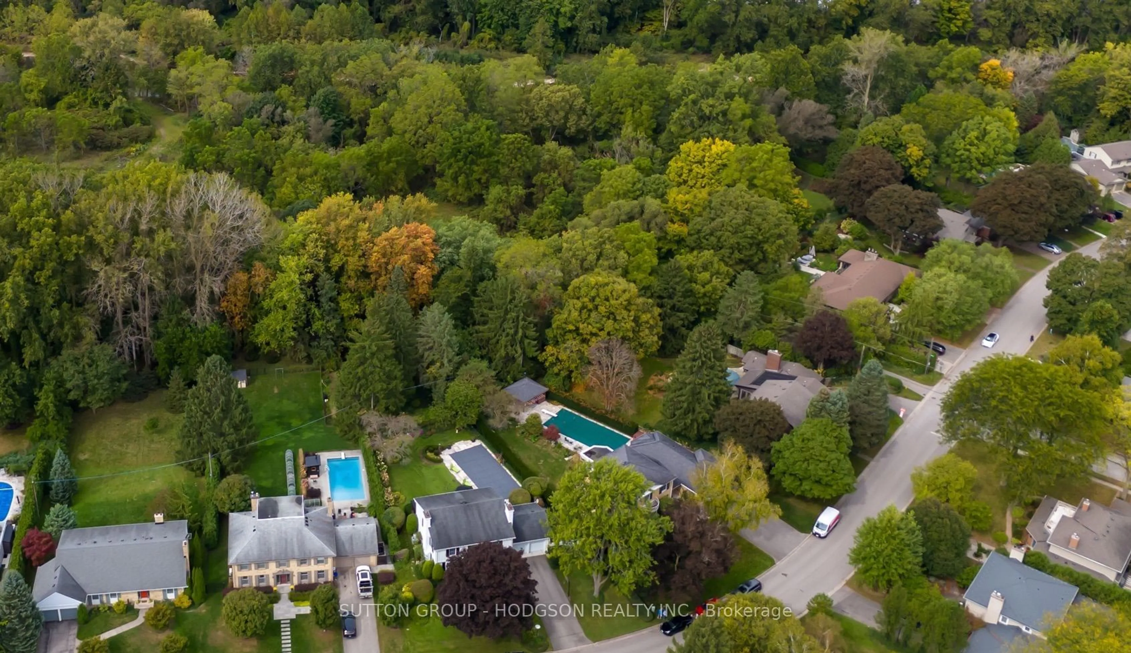 A pic from outside/outdoor area/front of a property/back of a property/a pic from drone, forest/trees view for 1089 The Parkway, London Ontario N6A 2W8