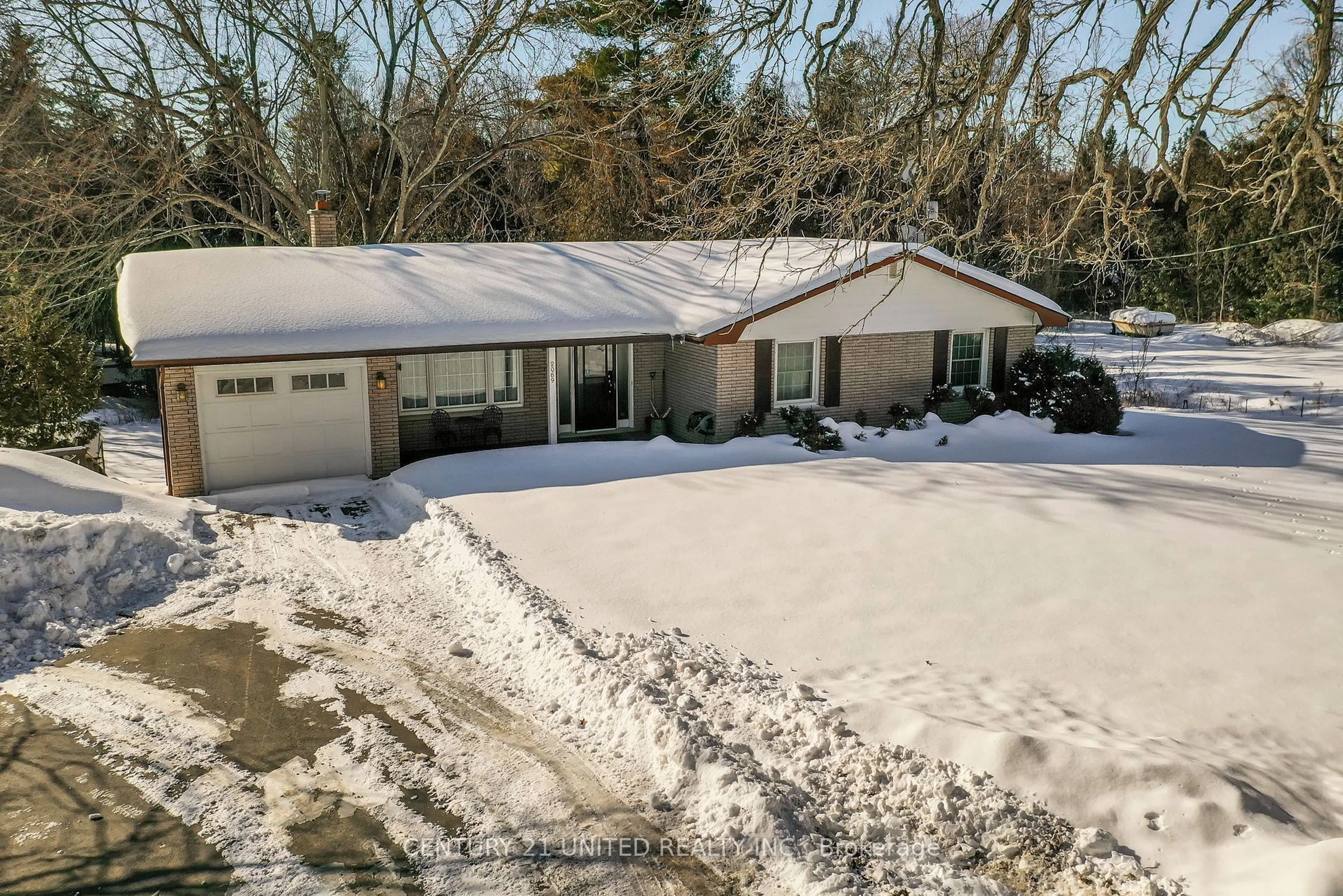 A pic from outside/outdoor area/front of a property/back of a property/a pic from drone, street for 2069 Young's Point Rd, Selwyn Ontario K0L 2H0