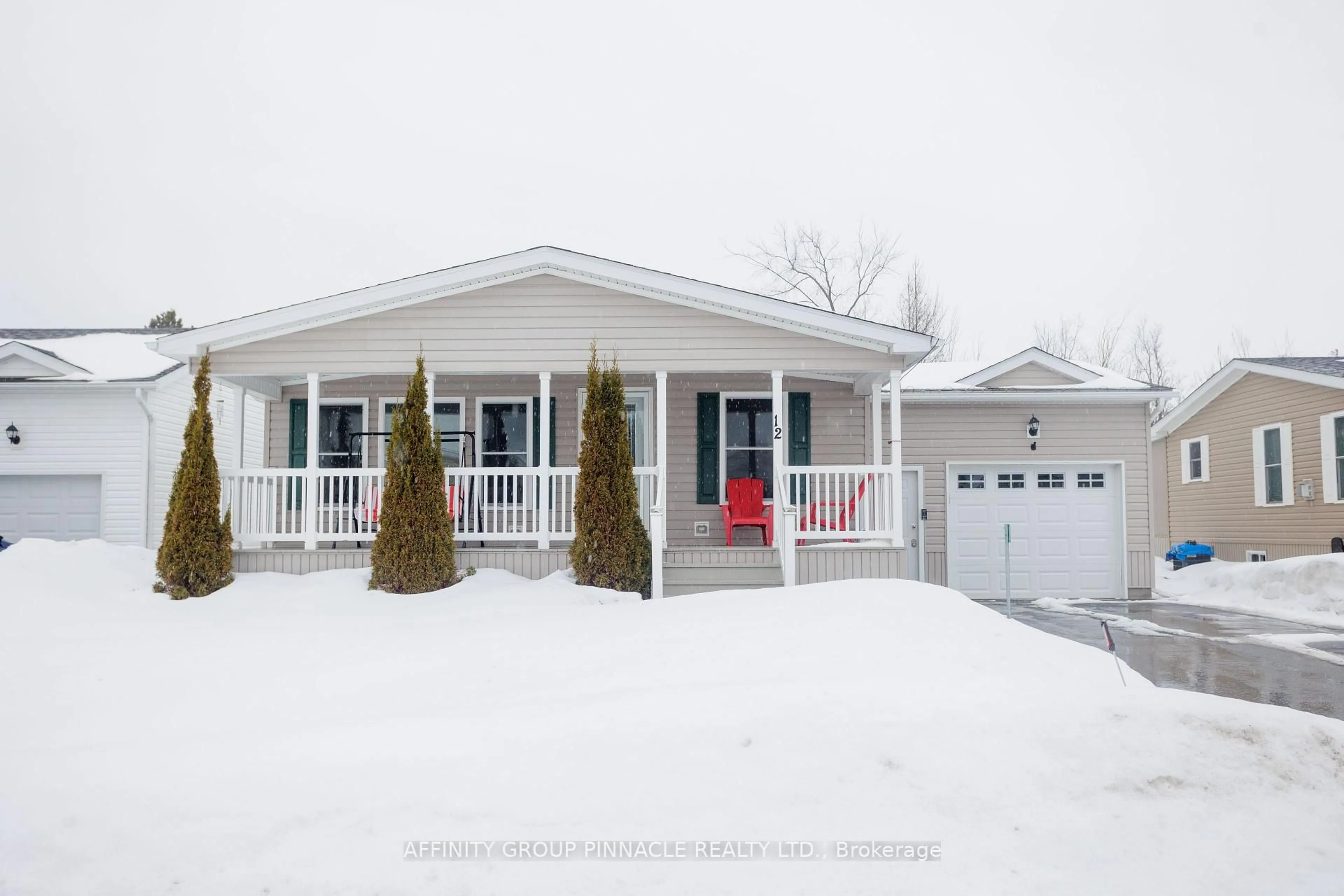 Home with vinyl exterior material, street for 12 Creekside Circ, Kawartha Lakes Ontario K0M 1L0