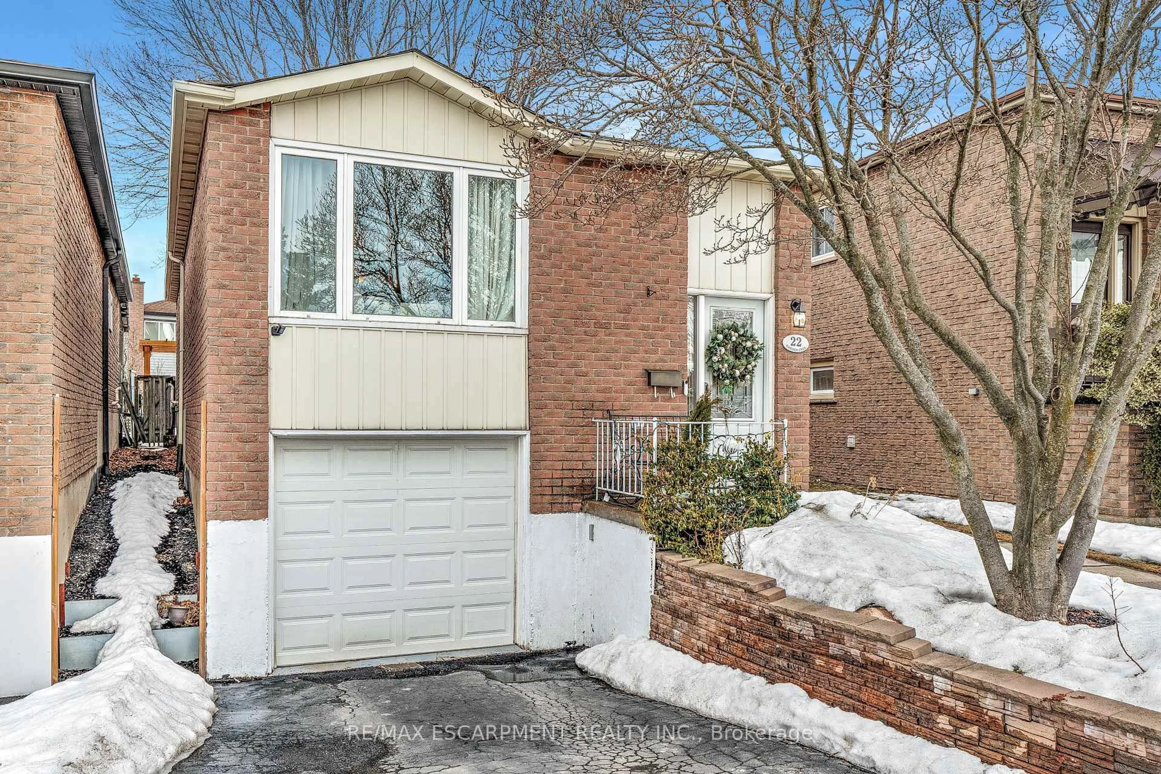 Home with brick exterior material, street for 22 Garden Cres, Hamilton Ontario L8V 4T4