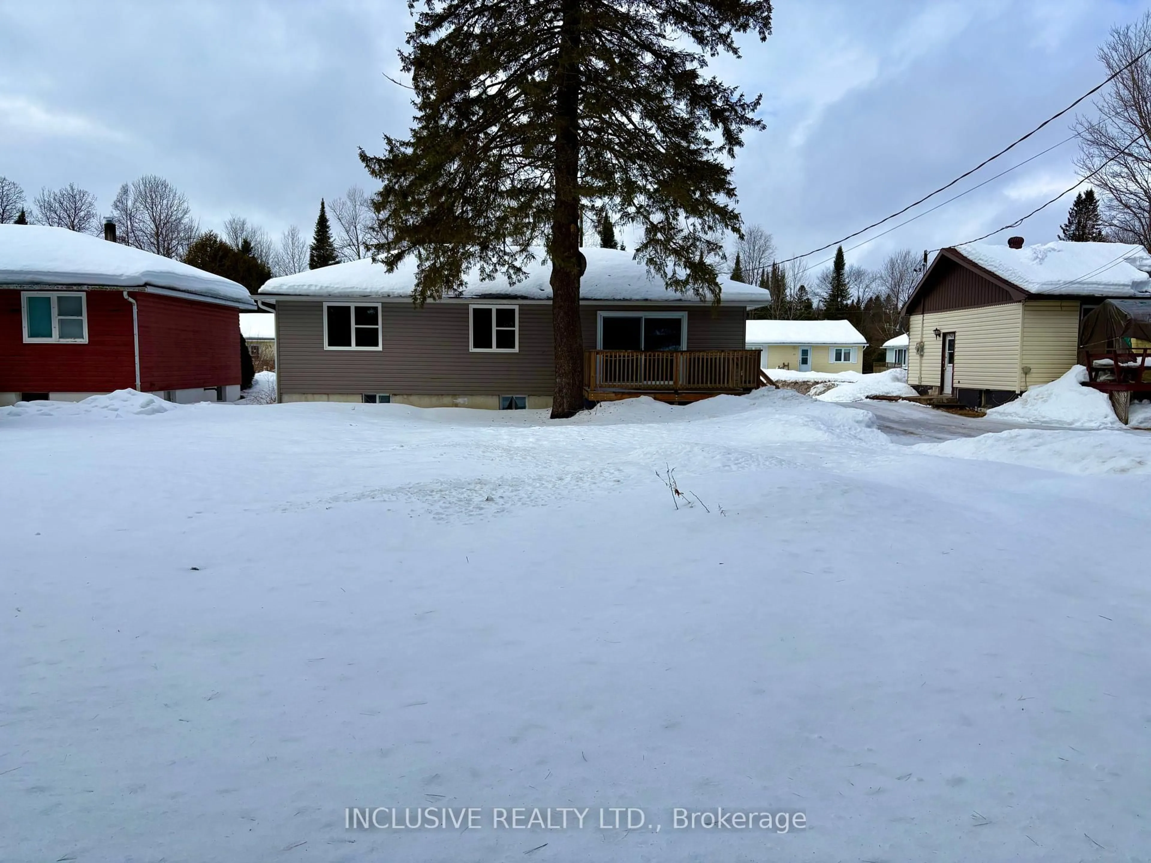 A pic from outside/outdoor area/front of a property/back of a property/a pic from drone, street for 37 Sprucedale St, Highlands East Ontario K0L 1M0