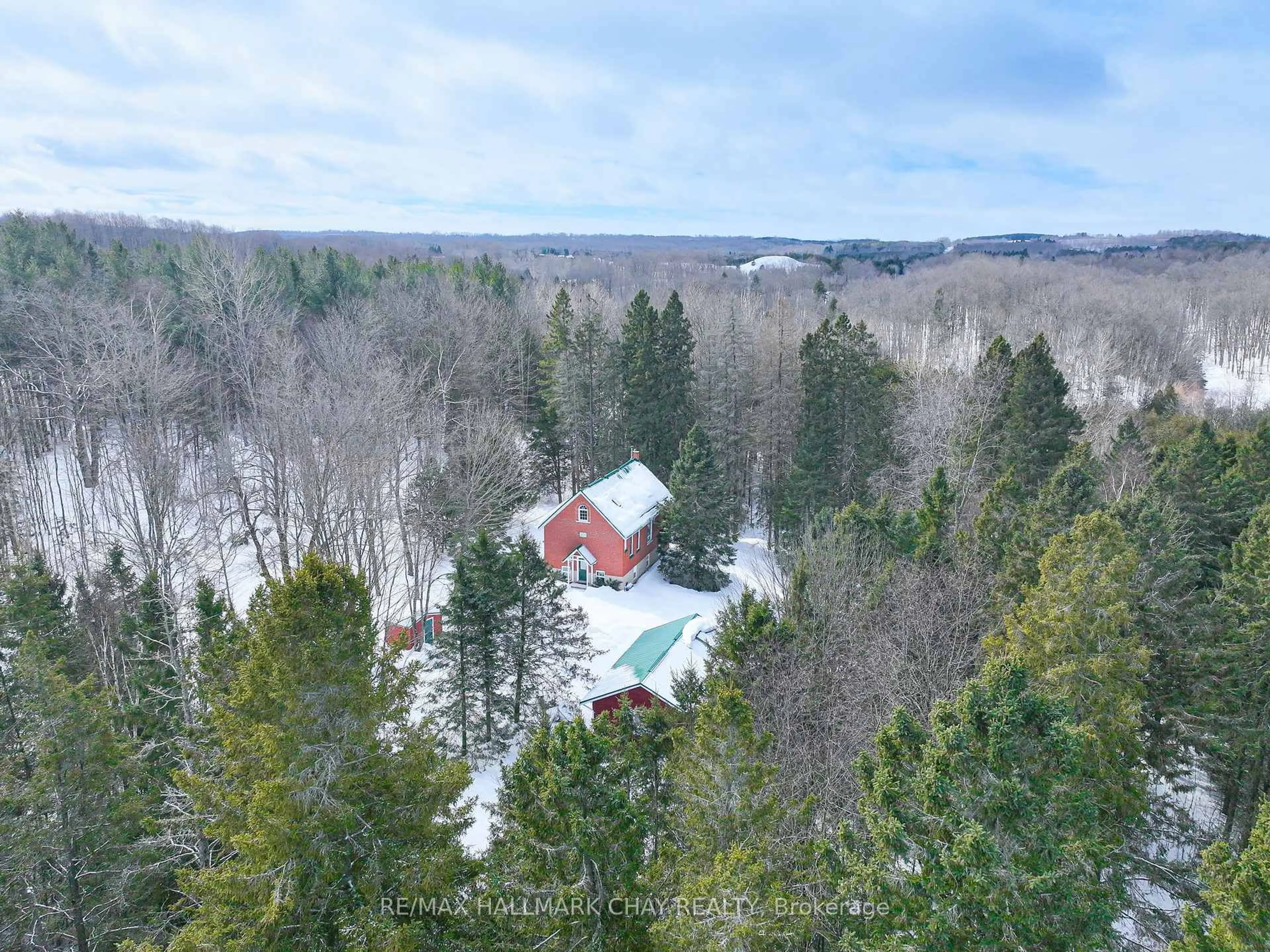 A pic from outside/outdoor area/front of a property/back of a property/a pic from drone, forest/trees view for 627379 15 Sdrd, Mulmur Ontario L9V 0T6