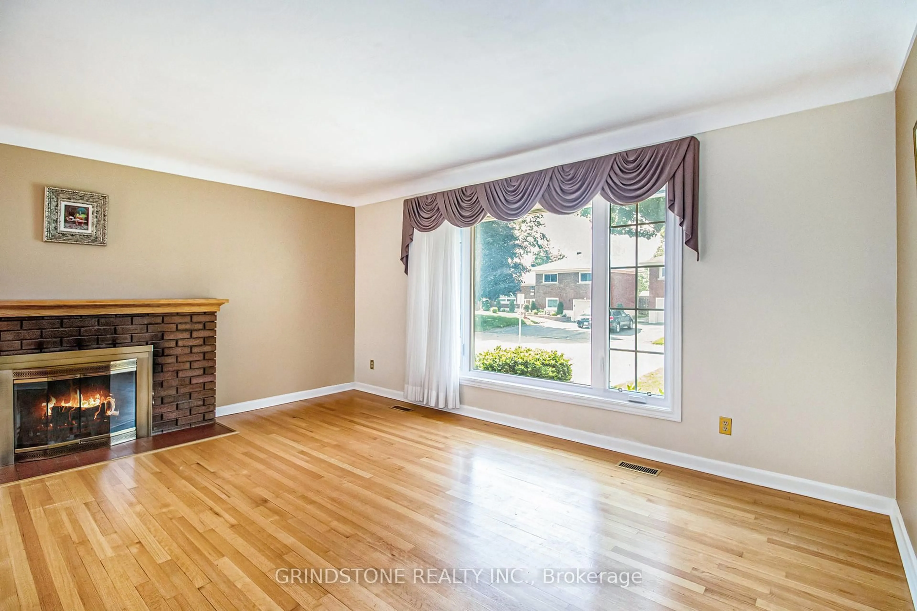 Living room with furniture, wood/laminate floor for 1806 Forman Ave, Ottawa Ontario K2C 1A8