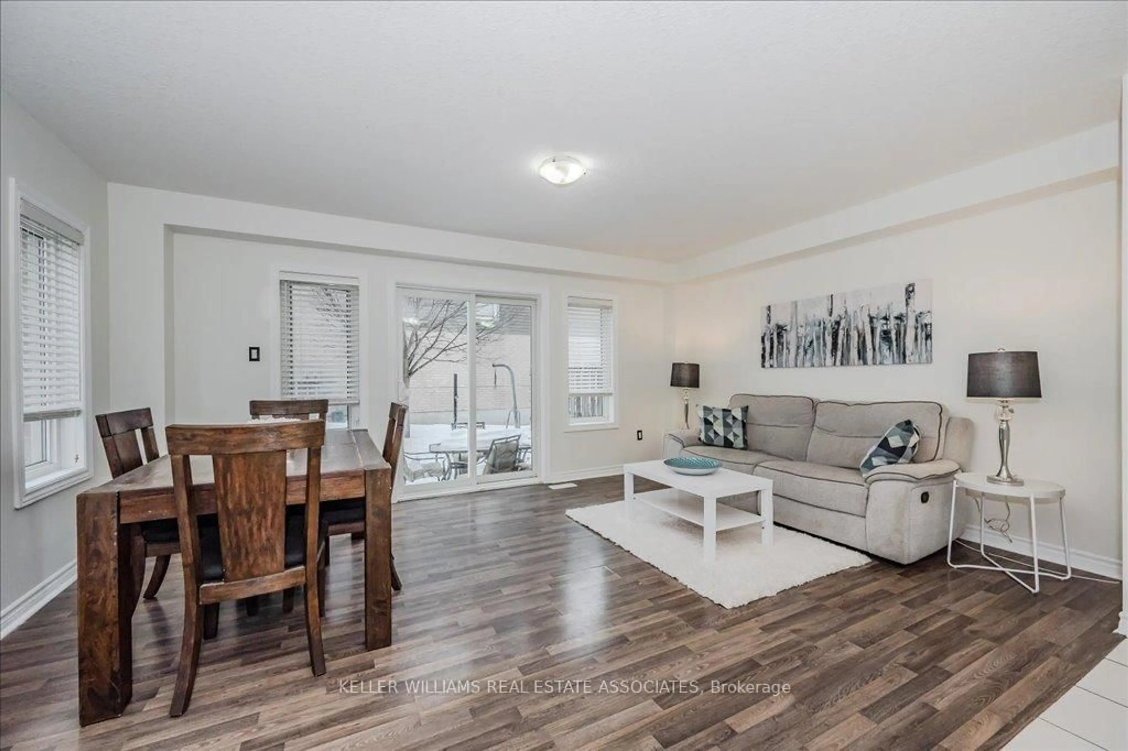 Living room with furniture, wood/laminate floor for 30 Arlington Cres, Guelph Ontario N1L 0K9