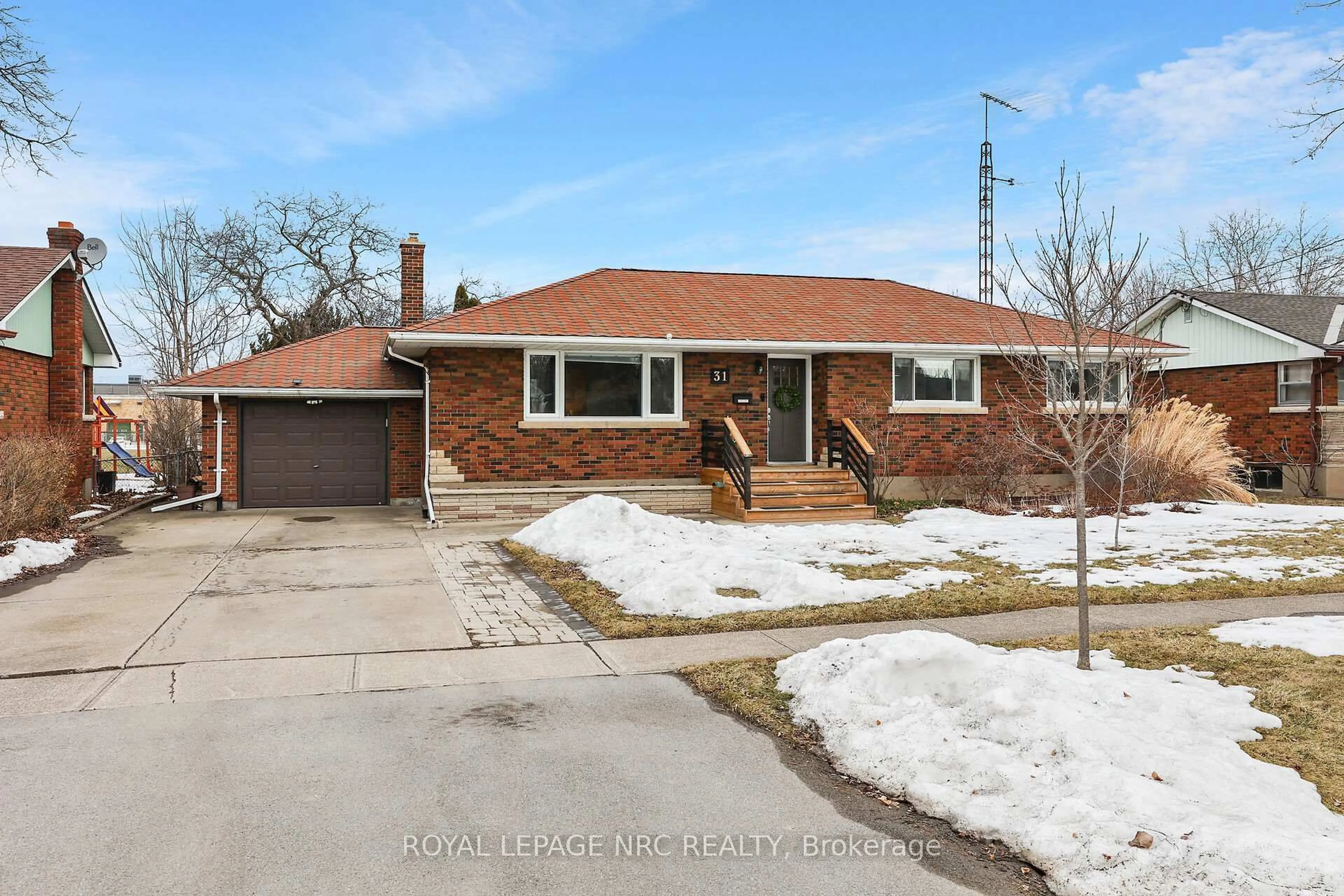 Home with brick exterior material, street for 31 Tamarack Ave, St. Catharines Ontario L2M 3C1