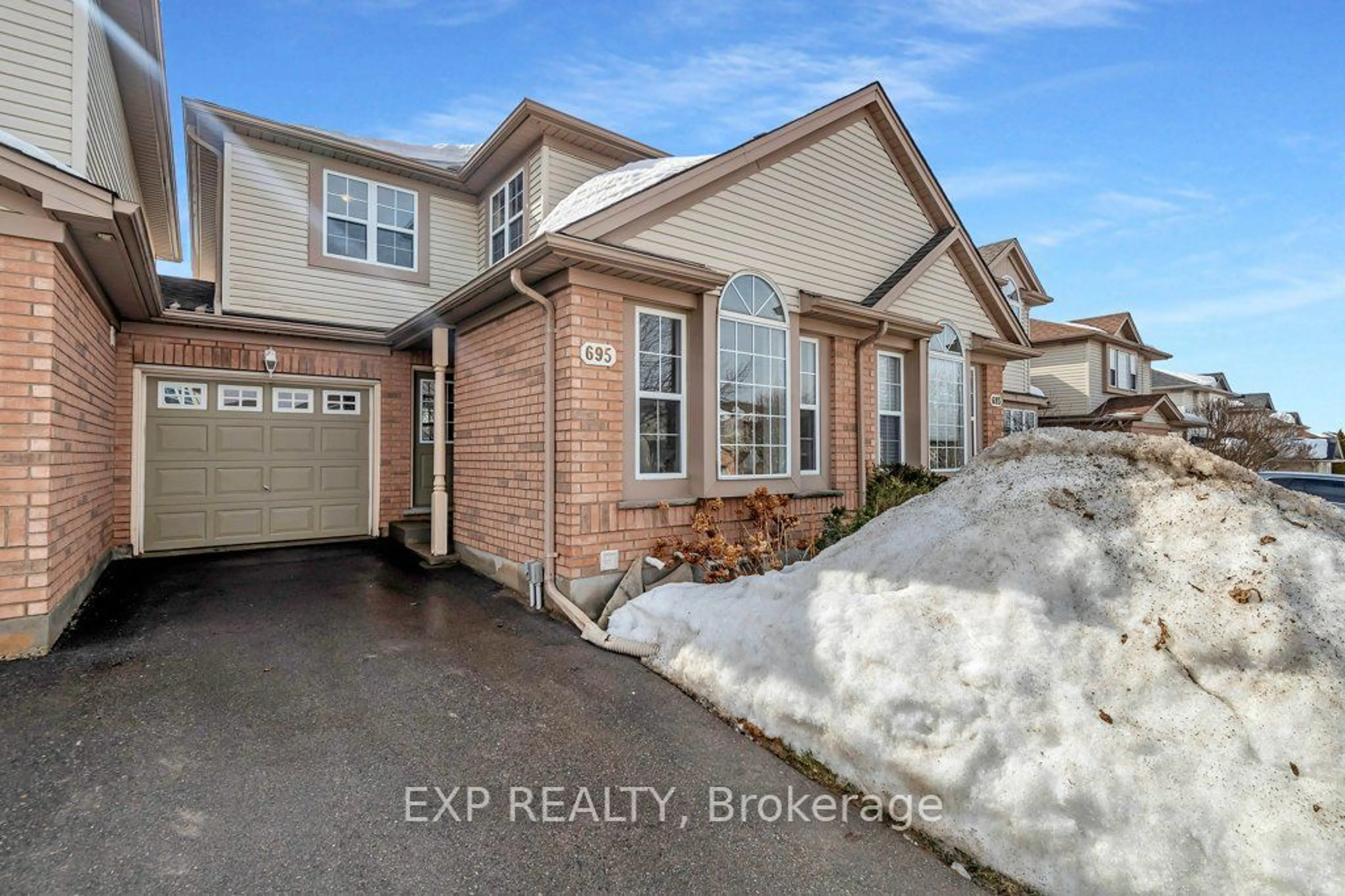 Home with brick exterior material, street for 695 Zermatt Dr, Waterloo Ontario N2T 2V2
