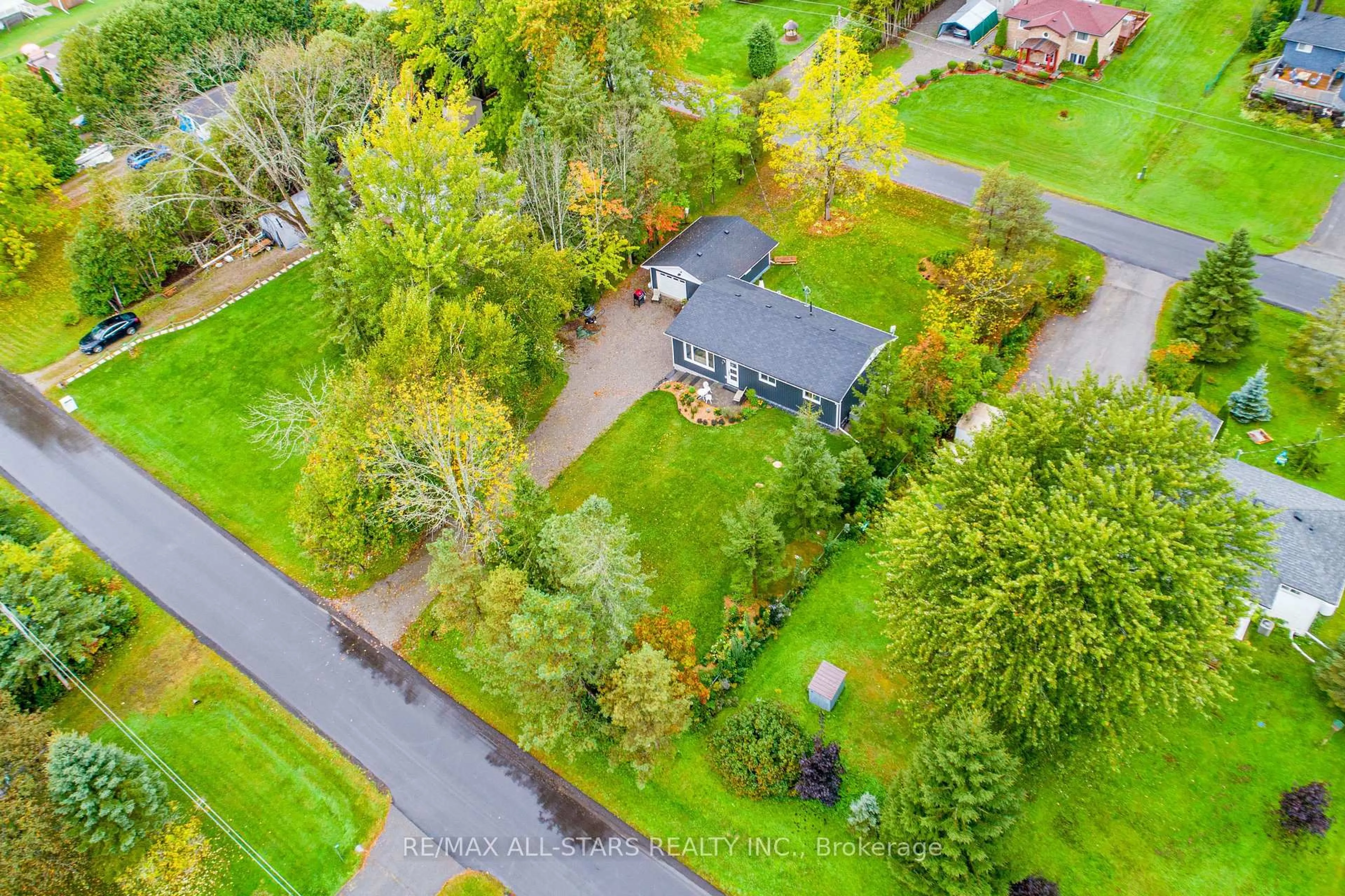 A pic from outside/outdoor area/front of a property/back of a property/a pic from drone, forest/trees view for 249 Crosby Dr, Kawartha Lakes Ontario K0M 1A0