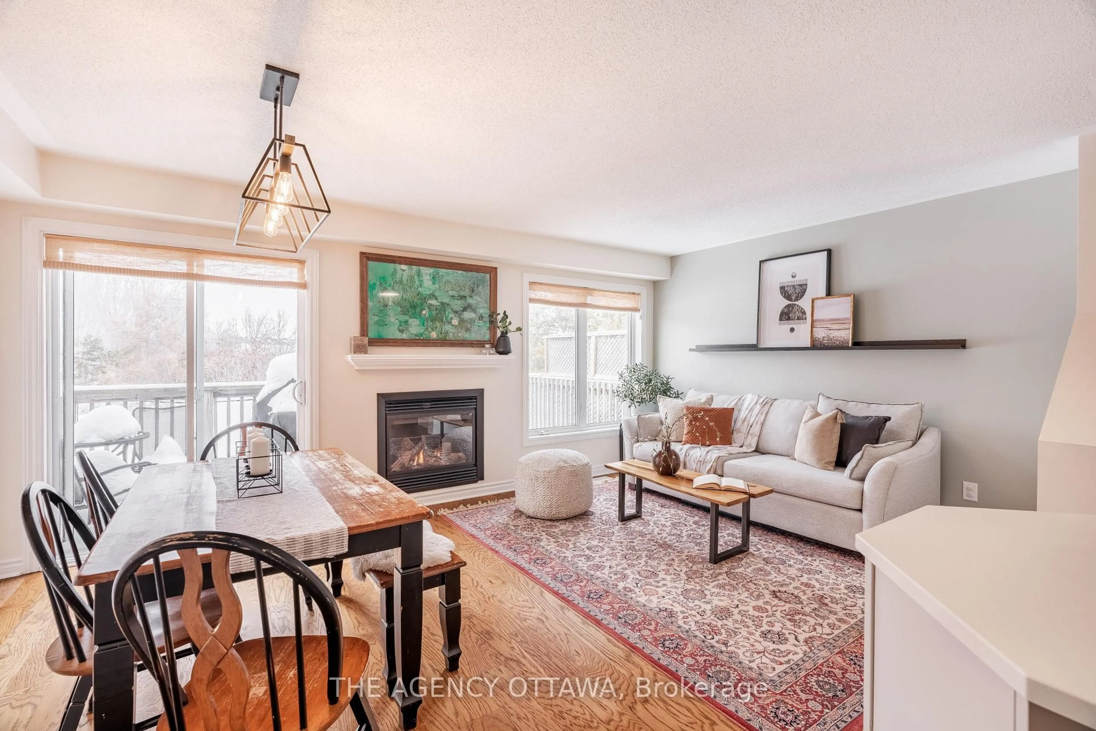 Living room with furniture, wood/laminate floor for 260 Catamount Crt, Kanata Ontario K2M 0A9