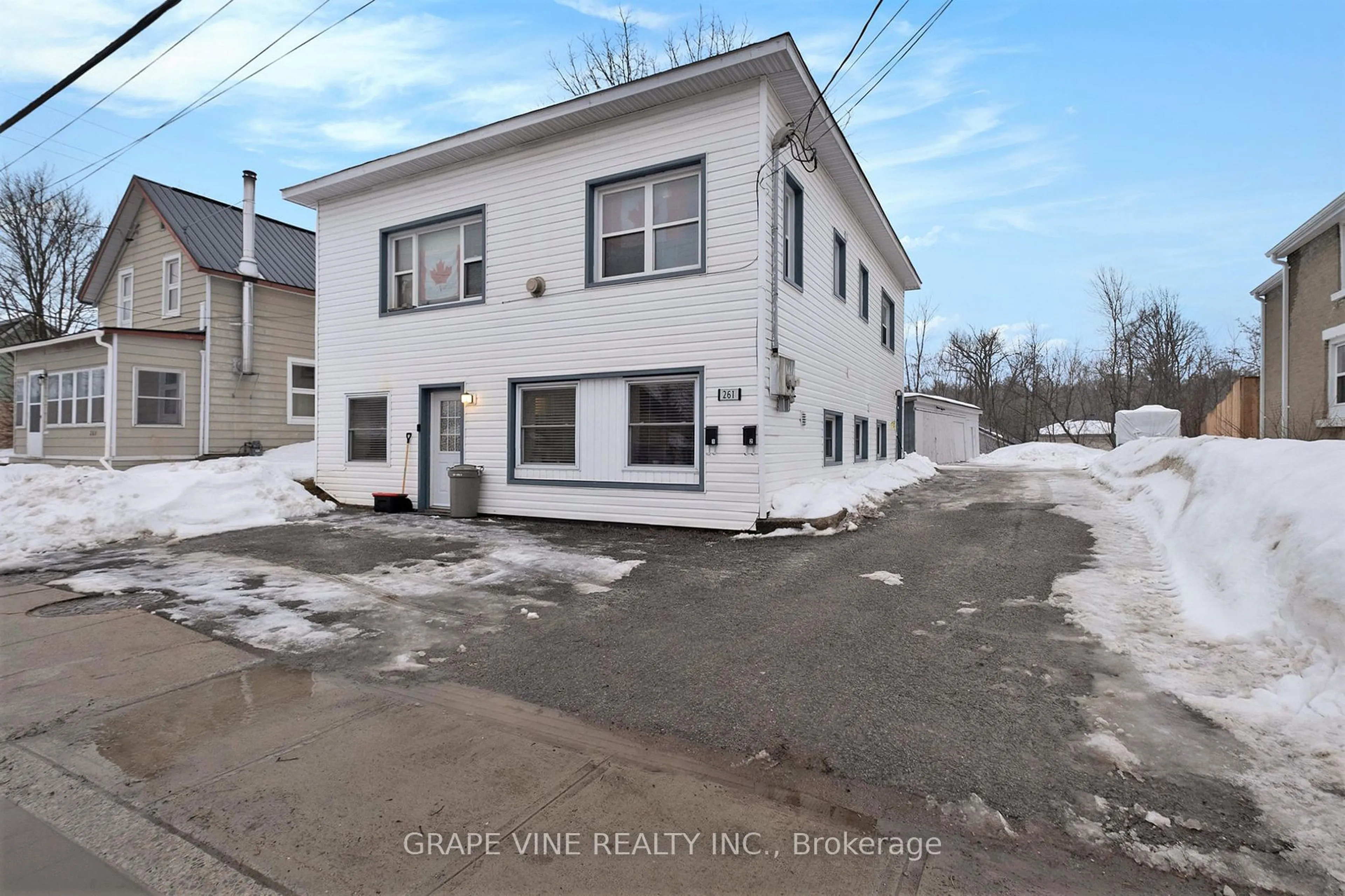 A pic from outside/outdoor area/front of a property/back of a property/a pic from drone, street for 261 ELGIN St #Apartment 1 and 2, Arnprior Ontario K7S 1P5