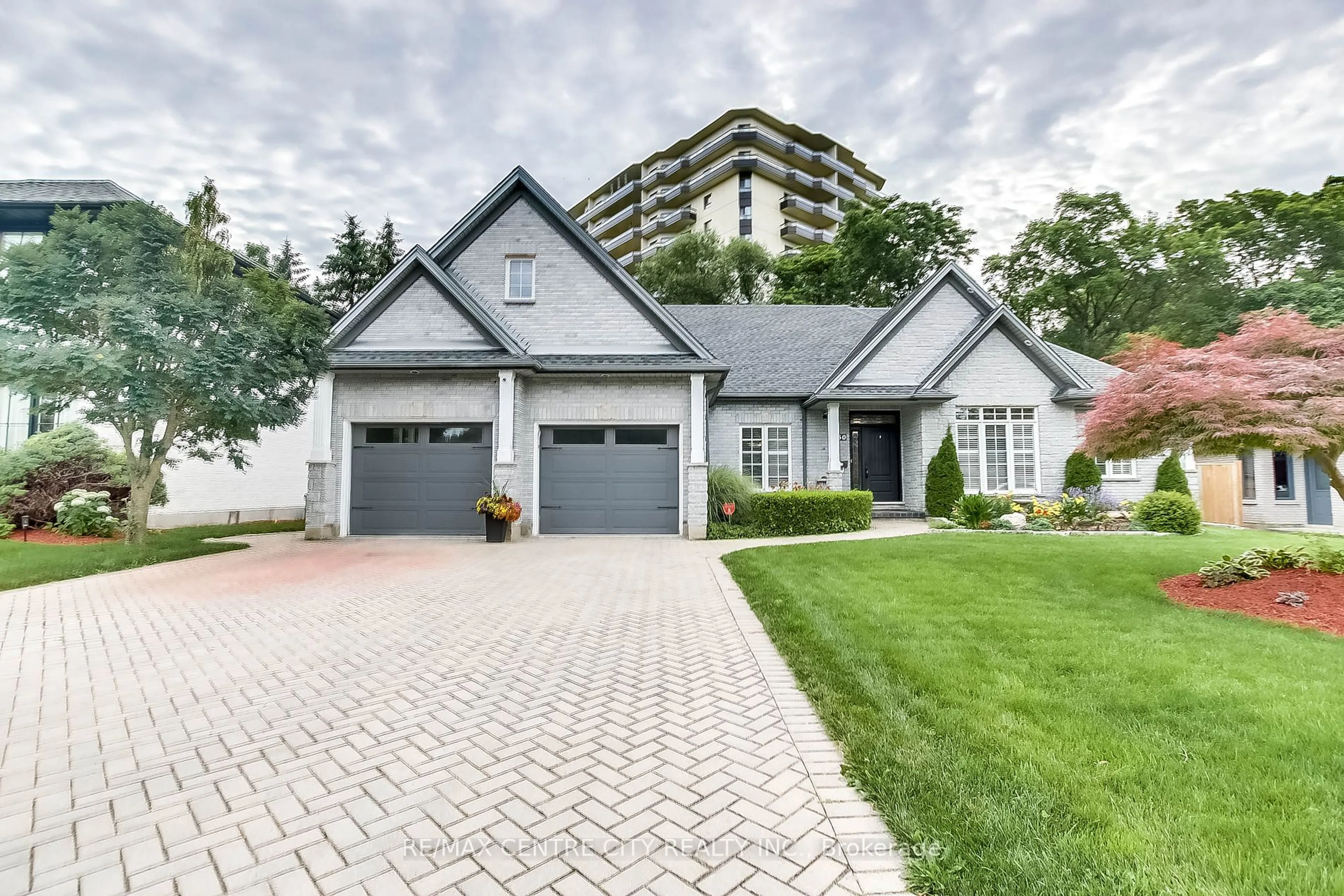 Home with brick exterior material, street for 50 Exmoor Pl, London Ontario N5X 3W2