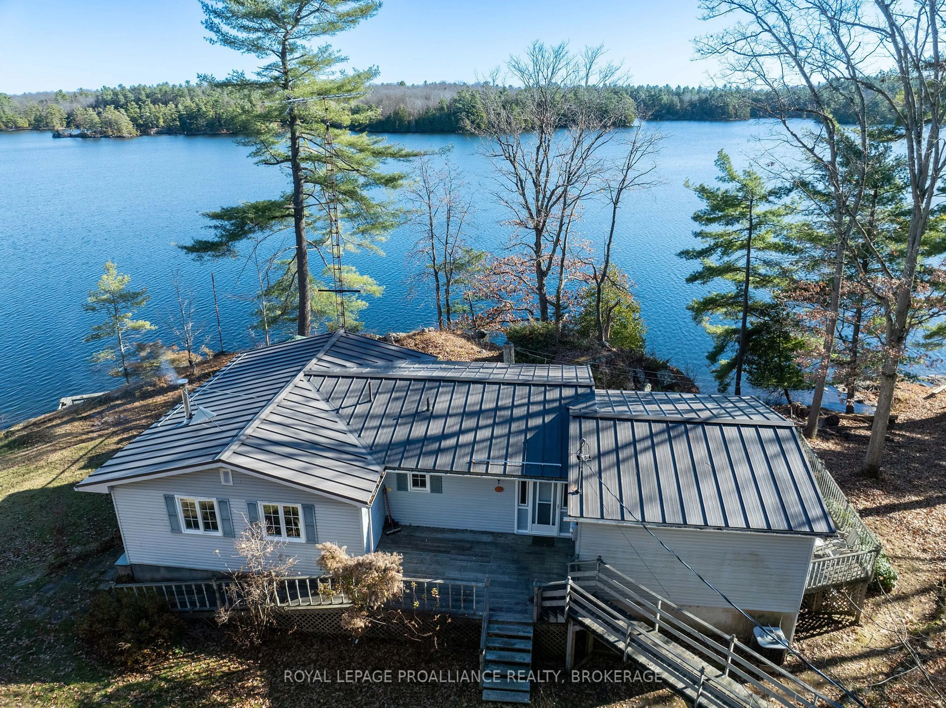 A pic from outside/outdoor area/front of a property/back of a property/a pic from drone, water/lake/river/ocean view for 222 Creek Crossing Lane, Rideau Lakes Ontario K0G 1X0