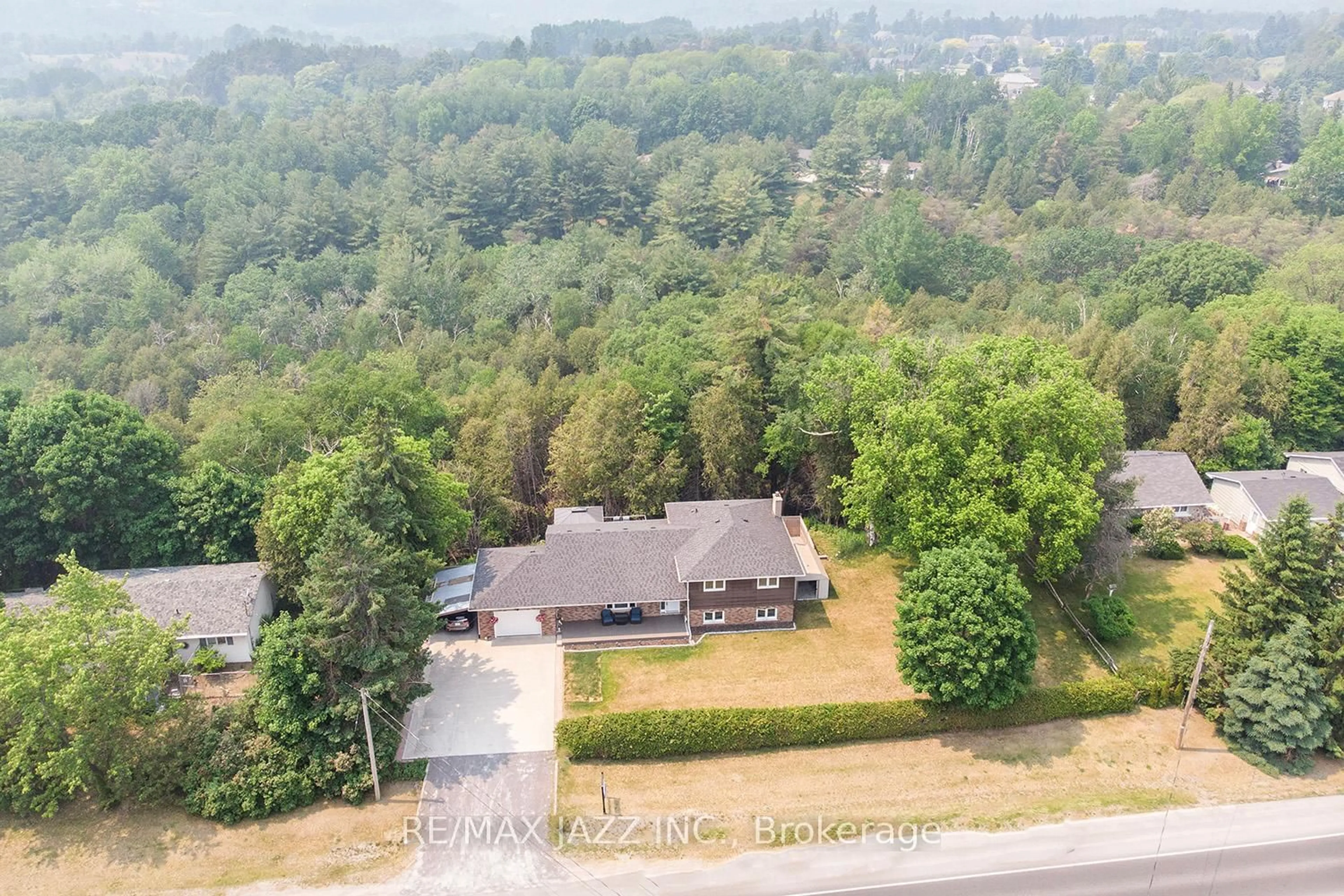 A pic from outside/outdoor area/front of a property/back of a property/a pic from drone, forest/trees view for 4568 County Road 45, Hamilton Township Ontario K9A 4J7