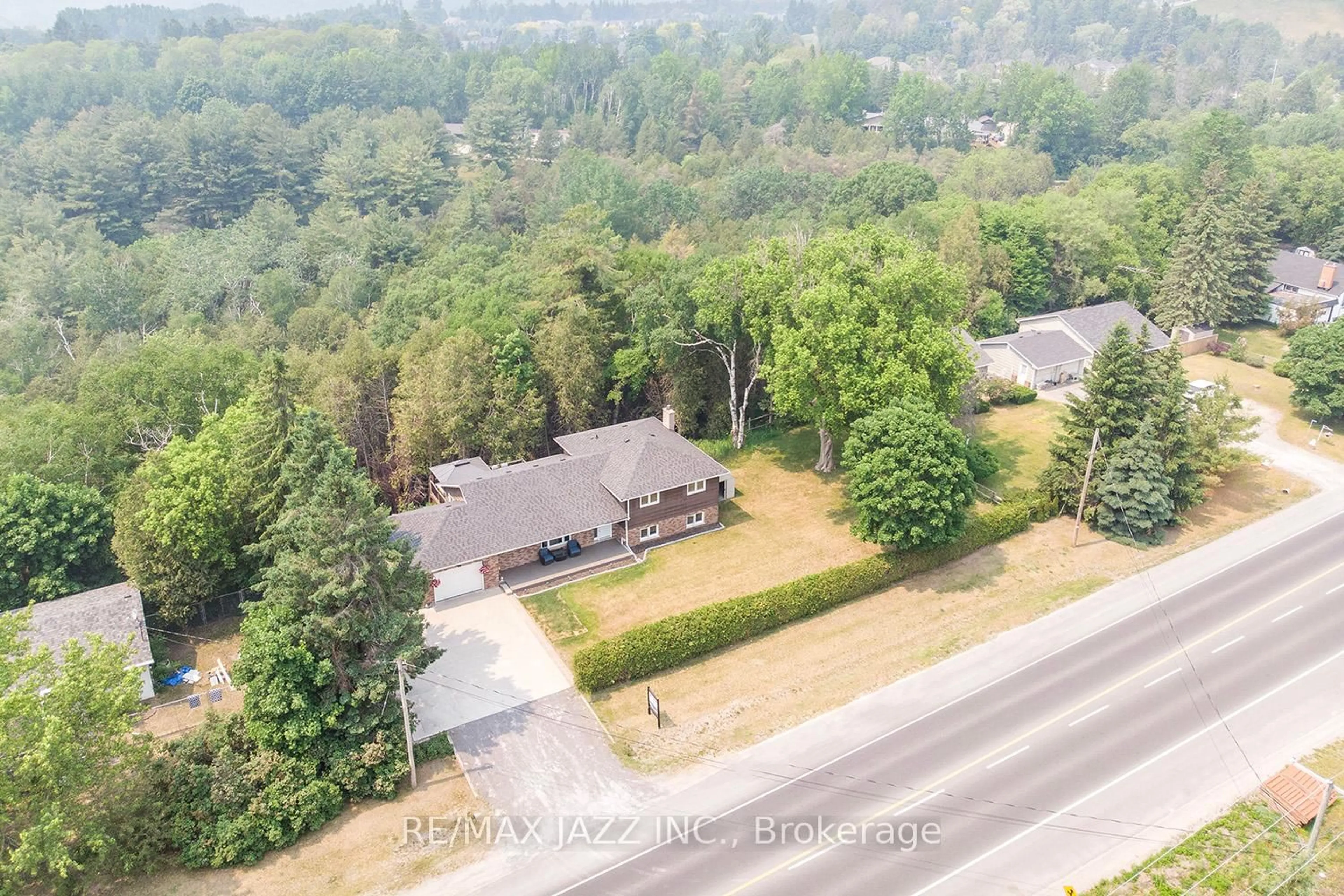 A pic from outside/outdoor area/front of a property/back of a property/a pic from drone, forest/trees view for 4568 County Road 45, Hamilton Township Ontario K9A 4J7