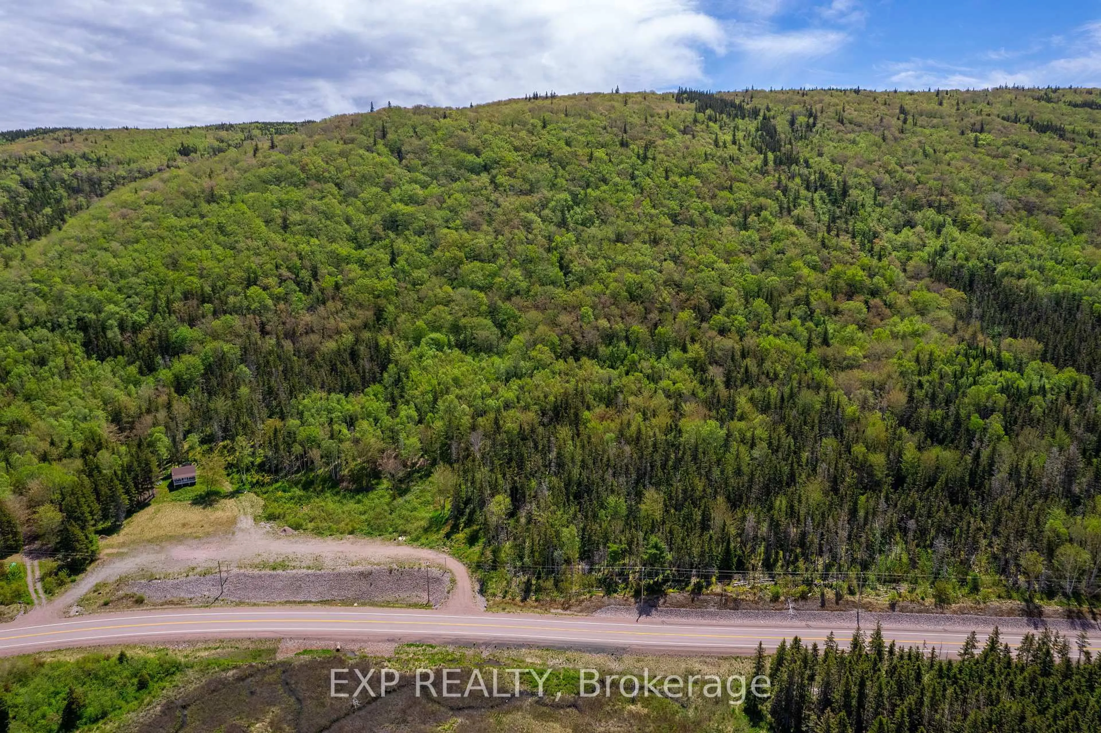 A pic from outside/outdoor area/front of a property/back of a property/a pic from drone, forest/trees view for 47403 Cabot Tr, Out of Area B0E 1B0