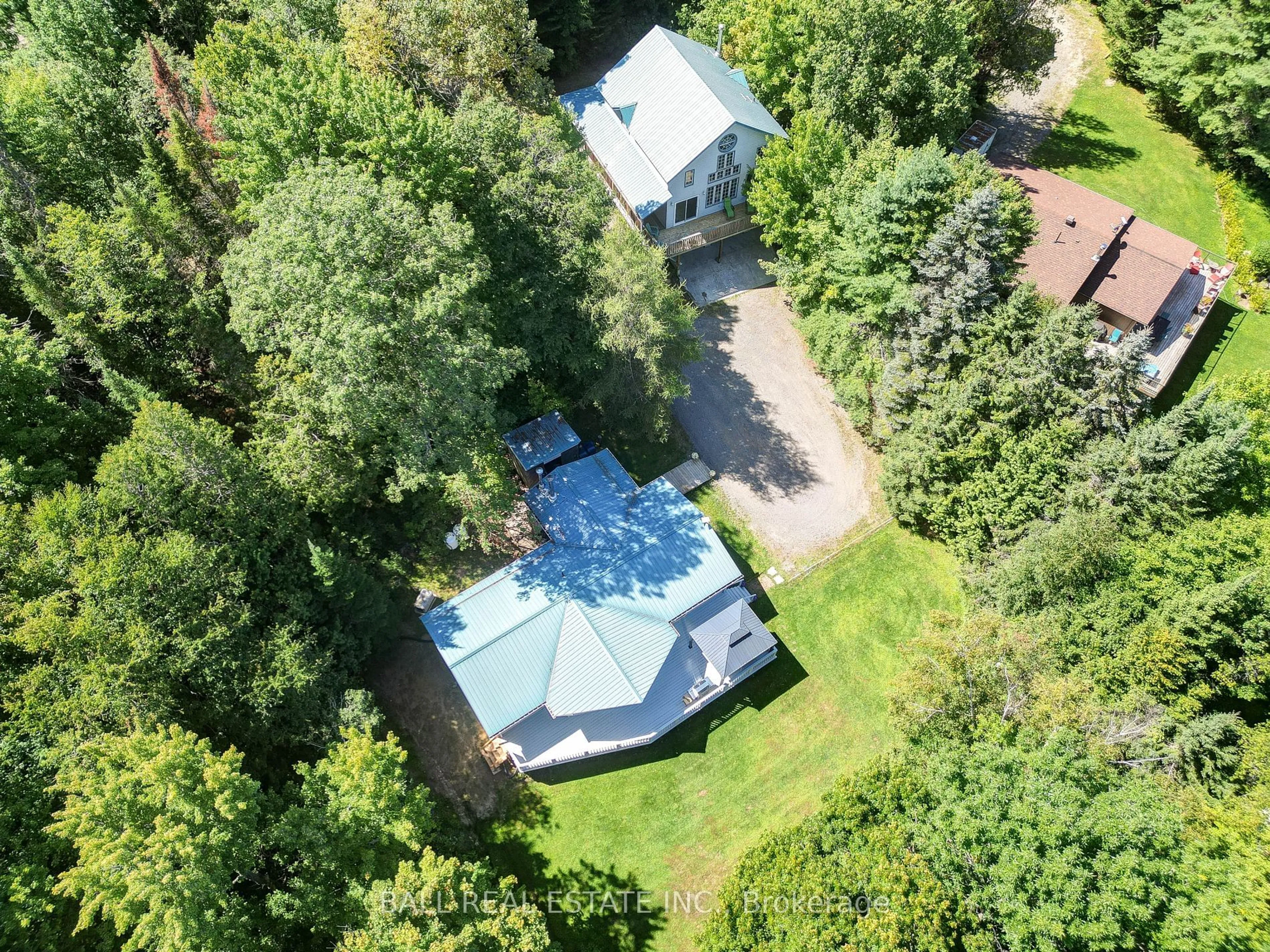 A pic from outside/outdoor area/front of a property/back of a property/a pic from drone, forest/trees view for 75 Maple Ridge Lane, Wollaston Ontario K0L 1P0