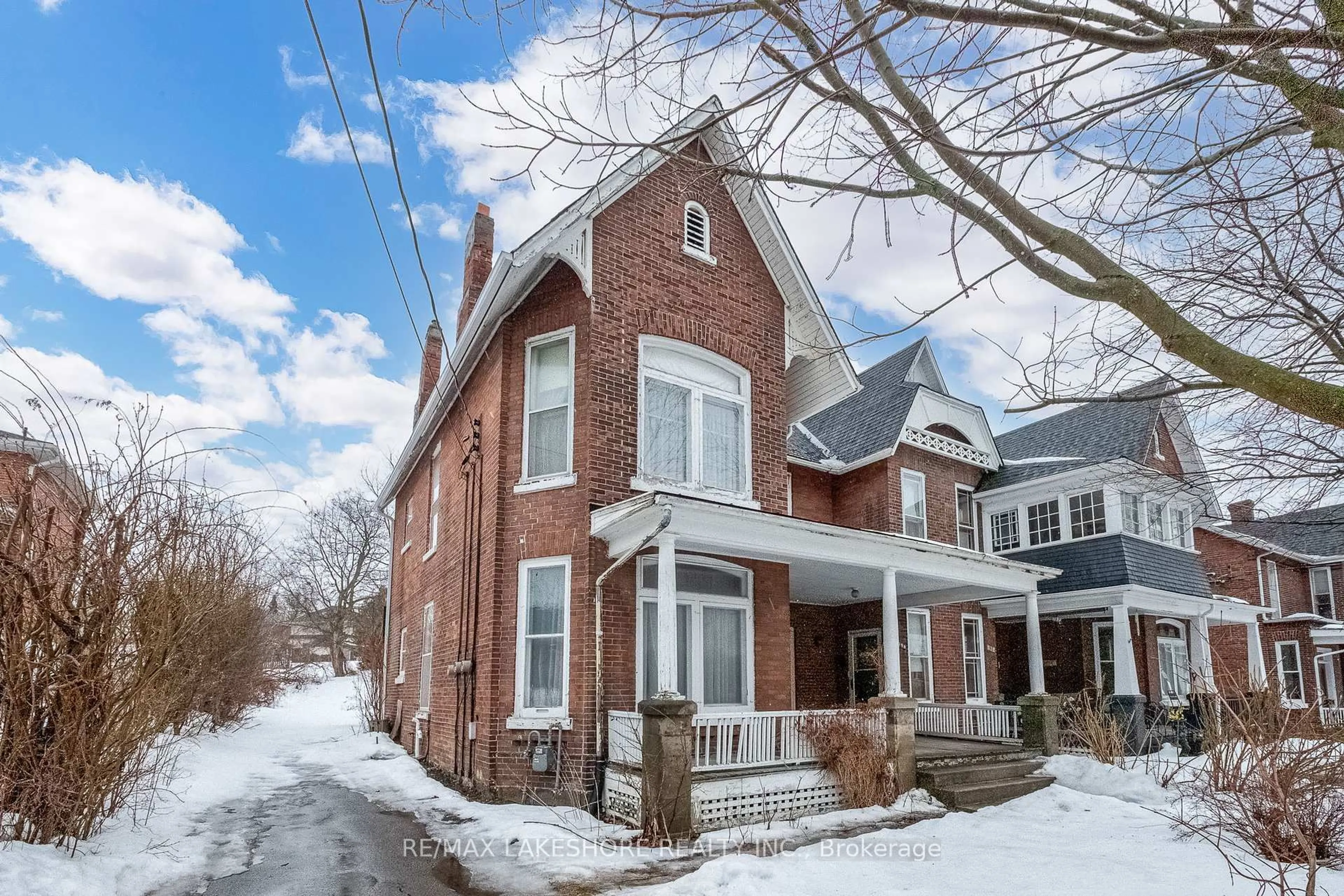 Home with brick exterior material, street for 99 Mill St #A&B, Port Hope Ontario L1A 2T3