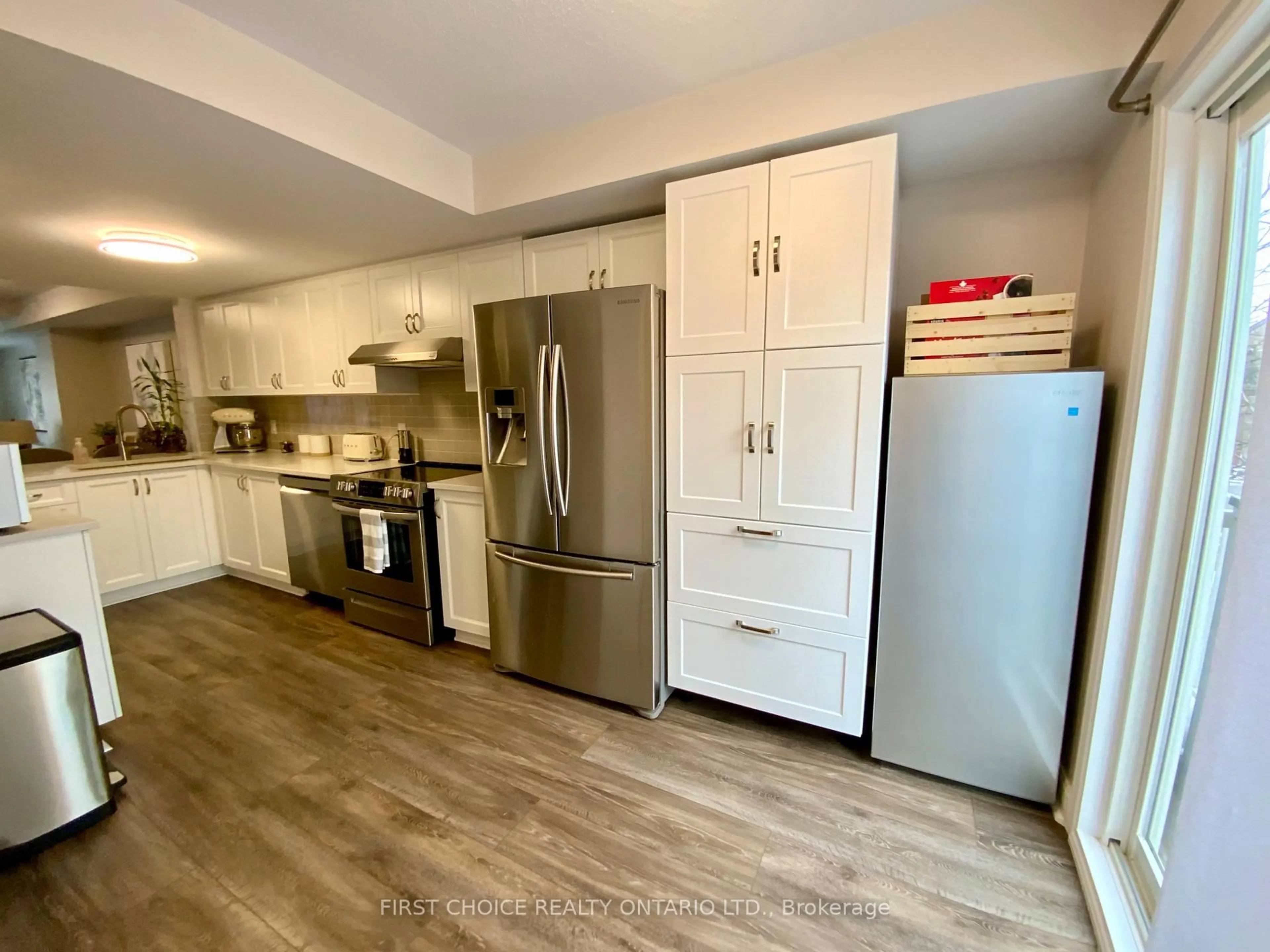 Open concept kitchen, wood/laminate floor for 46 Lakepointe Dr #10, Orleans - Cumberland and Area Ontario K4A 5E3