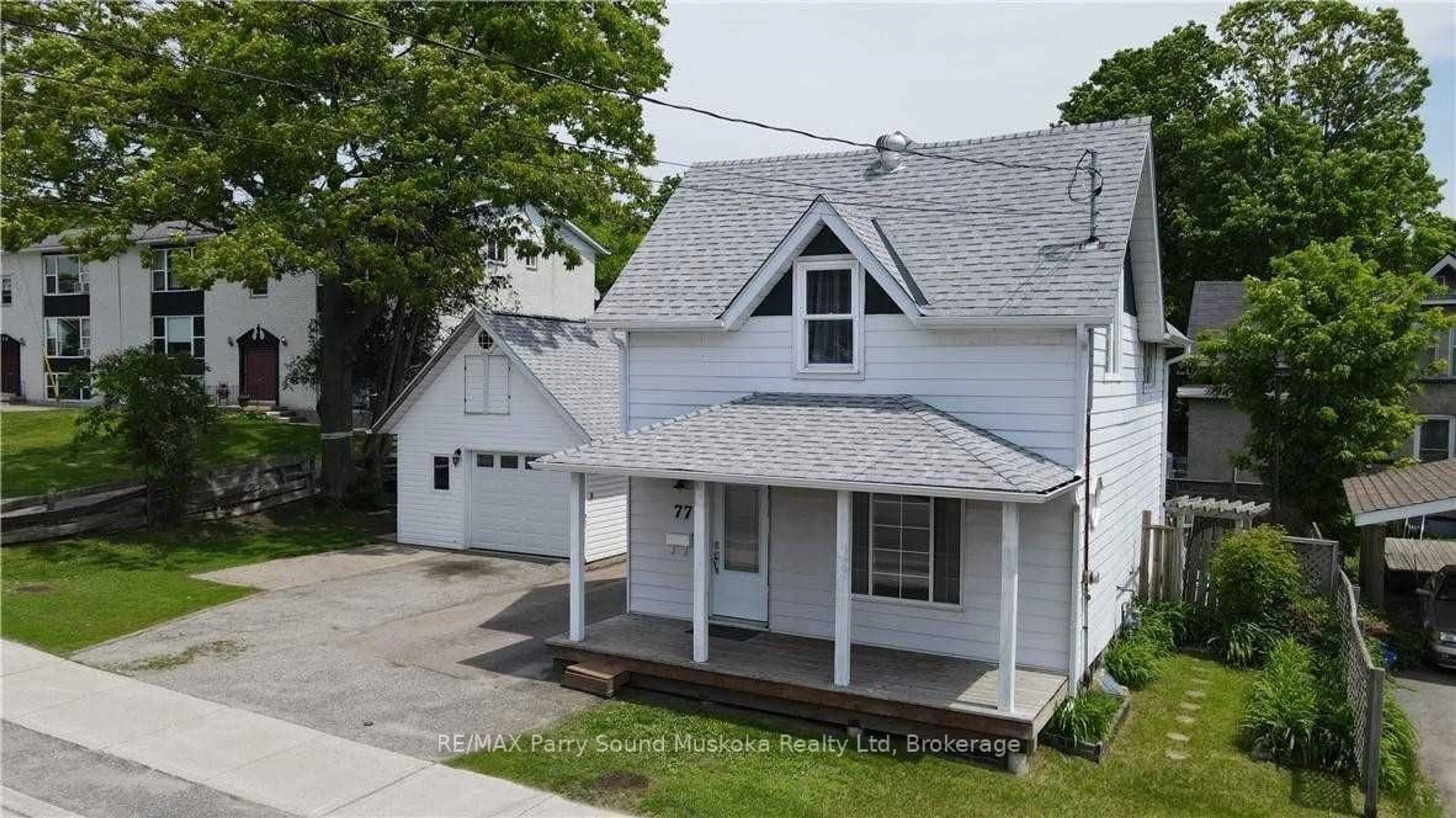 A pic from outside/outdoor area/front of a property/back of a property/a pic from drone, street for 77 Church St, Parry Sound Ontario P2A 1Z2