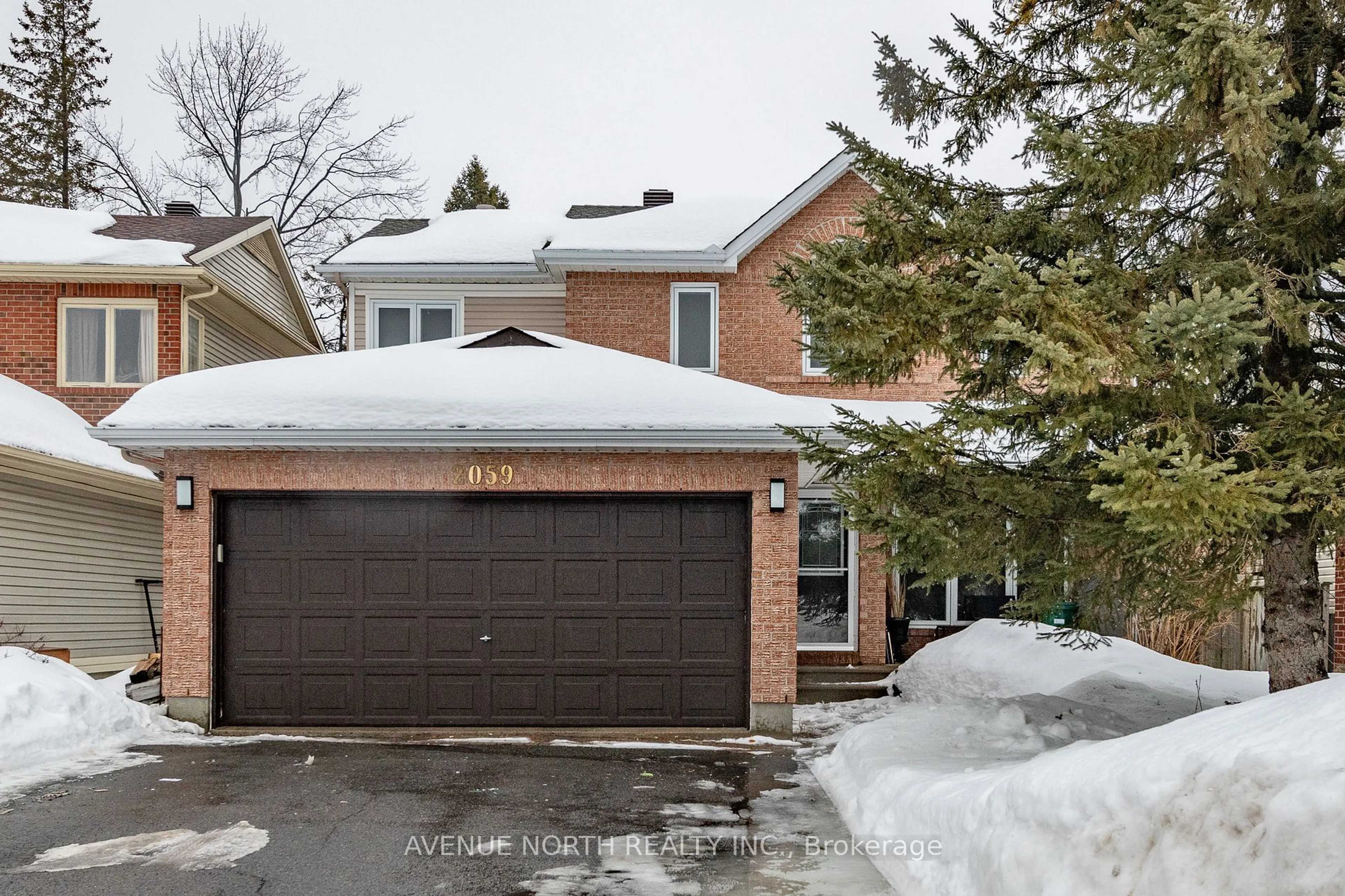 Home with brick exterior material, street for 2059 ROLLING BROOK Dr, Orleans - Convent Glen and Area Ontario K1W 1E2