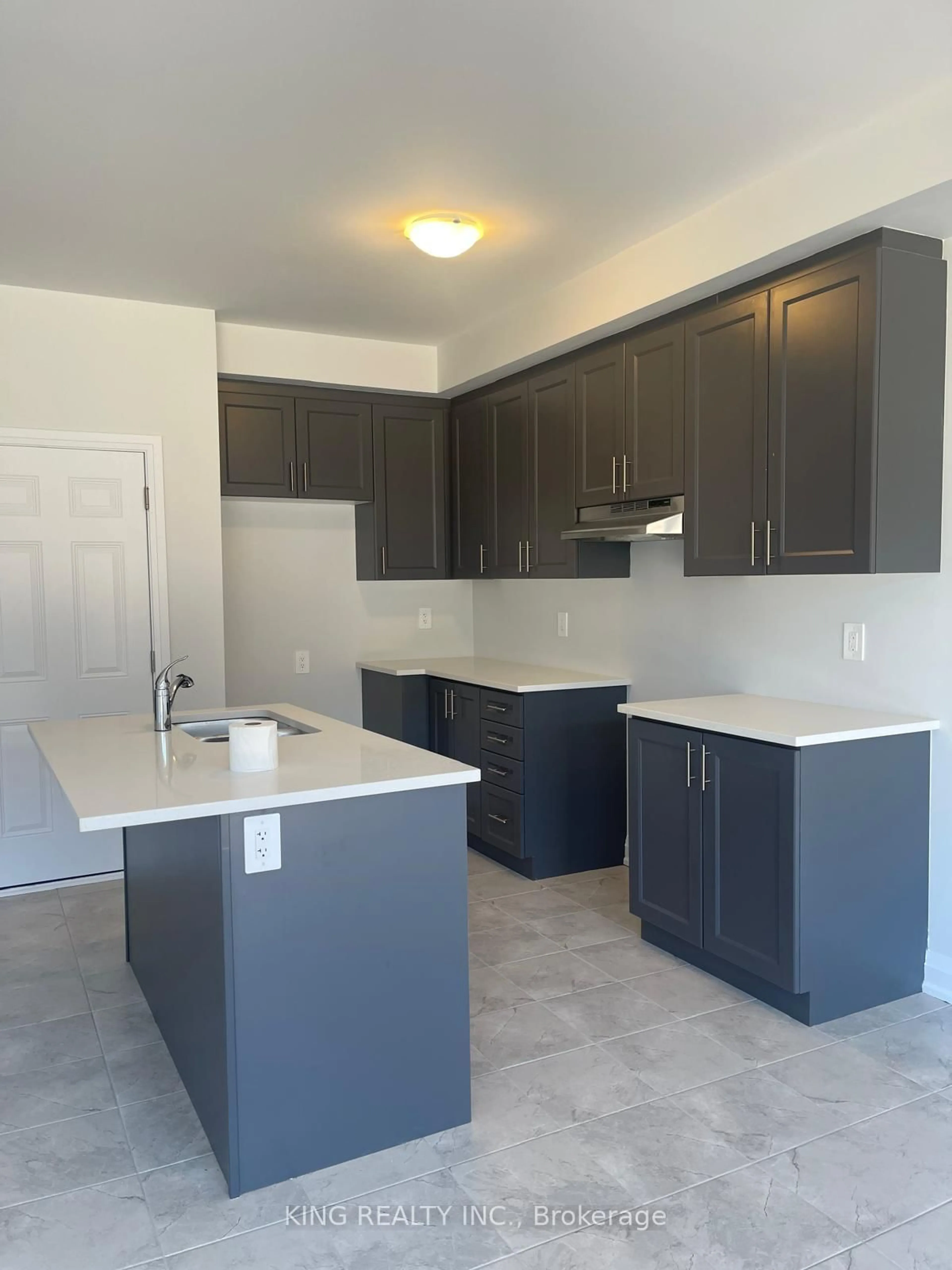 Open concept kitchen, ceramic/tile floor for 136 Corley St, Kawartha Lakes Ontario K9V 0R4