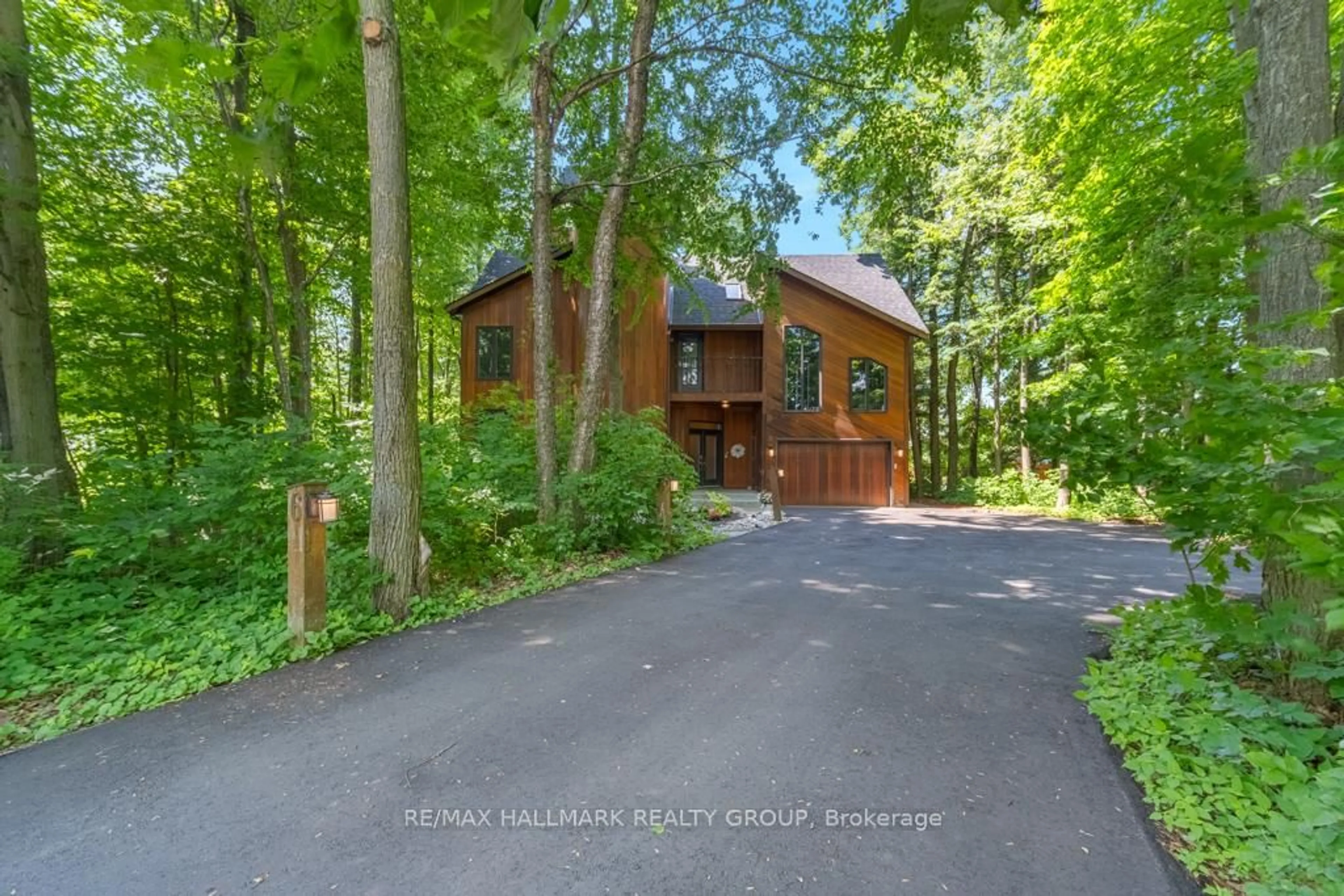 A pic from outside/outdoor area/front of a property/back of a property/a pic from drone, forest/trees view for 6 RYAN Crt, Russell Ontario K0A 1W0