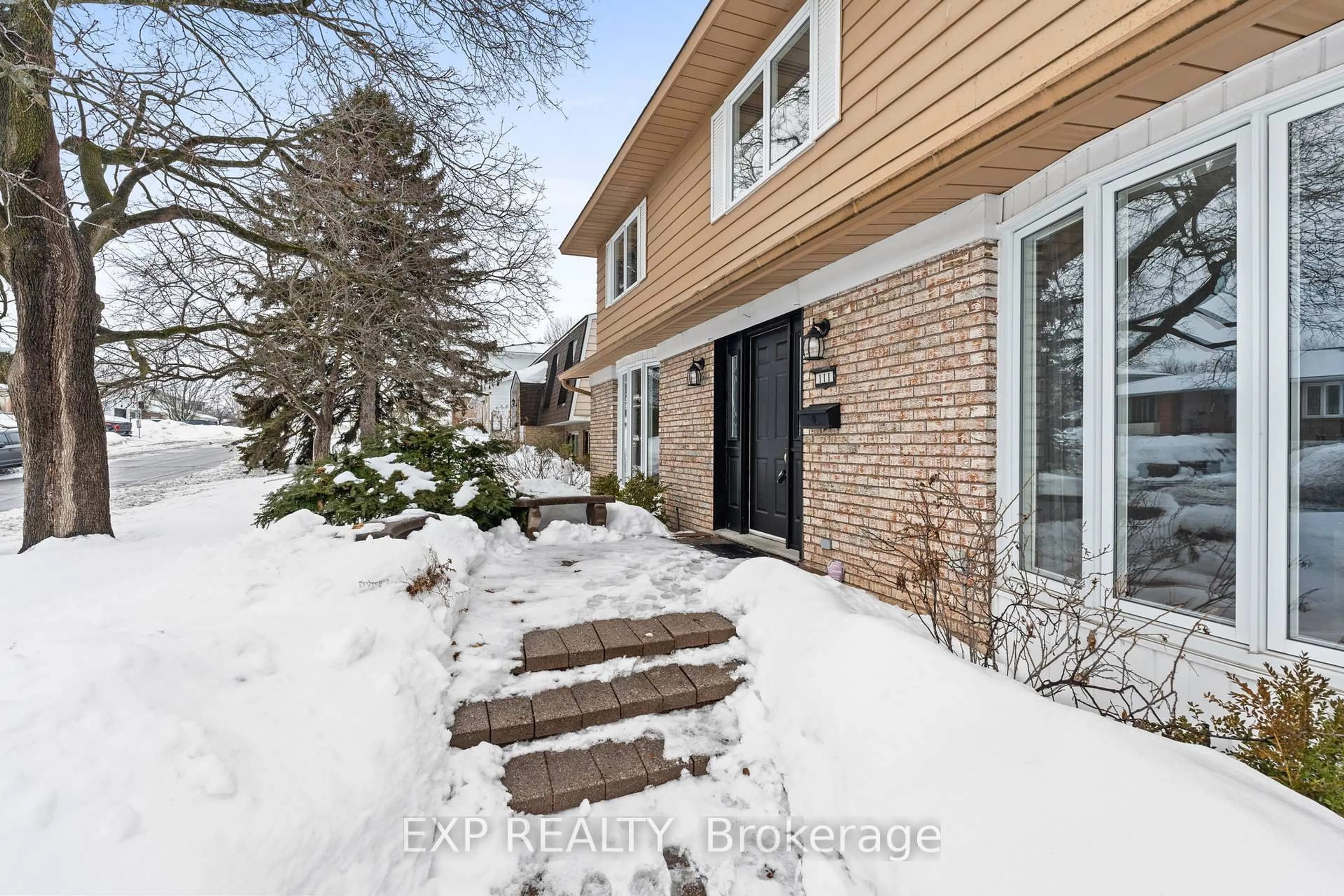 Home with brick exterior material, street for 111 Larkin Dr, Barrhaven Ontario K2J 1C2