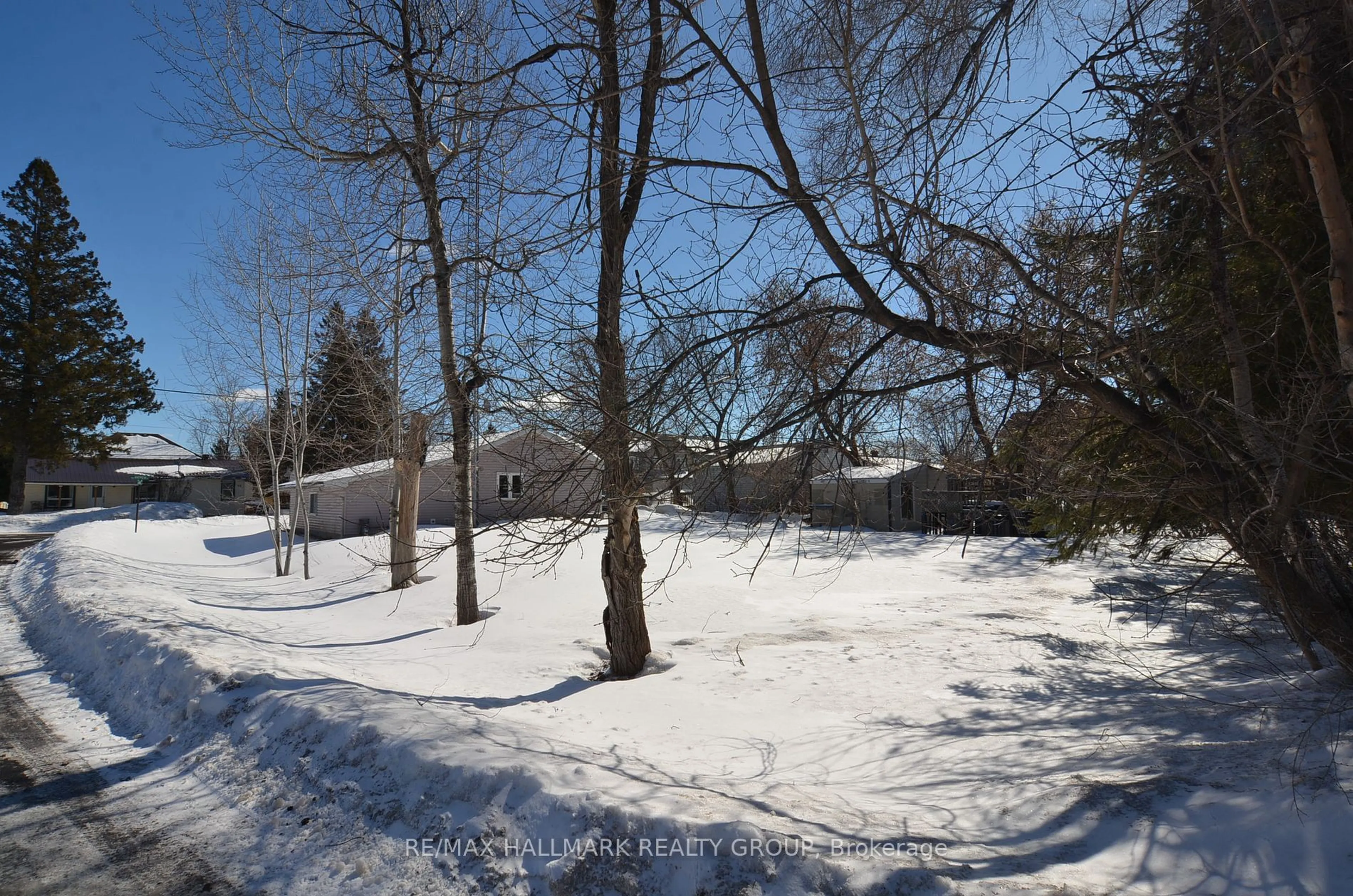 A pic from outside/outdoor area/front of a property/back of a property/a pic from drone, forest/trees view for 68 Andrew St, The Nation Ontario K0A 2M0