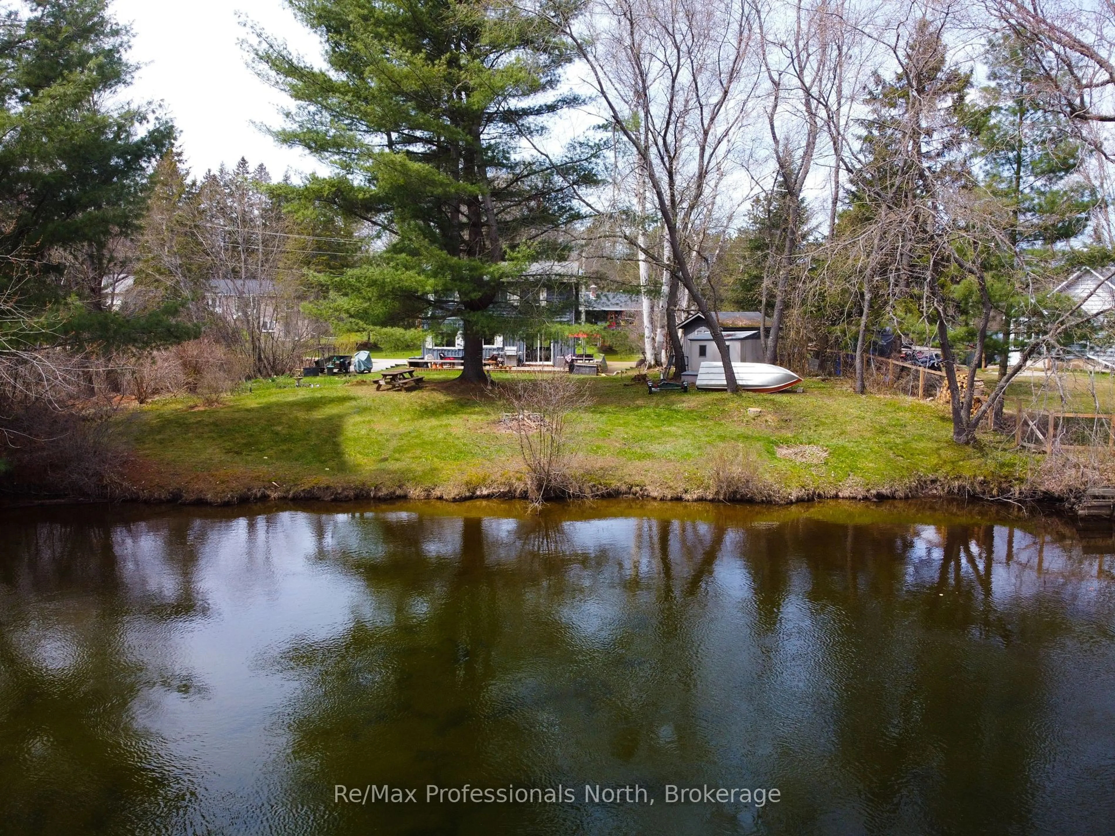 A pic from outside/outdoor area/front of a property/back of a property/a pic from drone, water/lake/river/ocean view for 80 INVERGORDON Ave, Minden Hills Ontario K0M 2K0