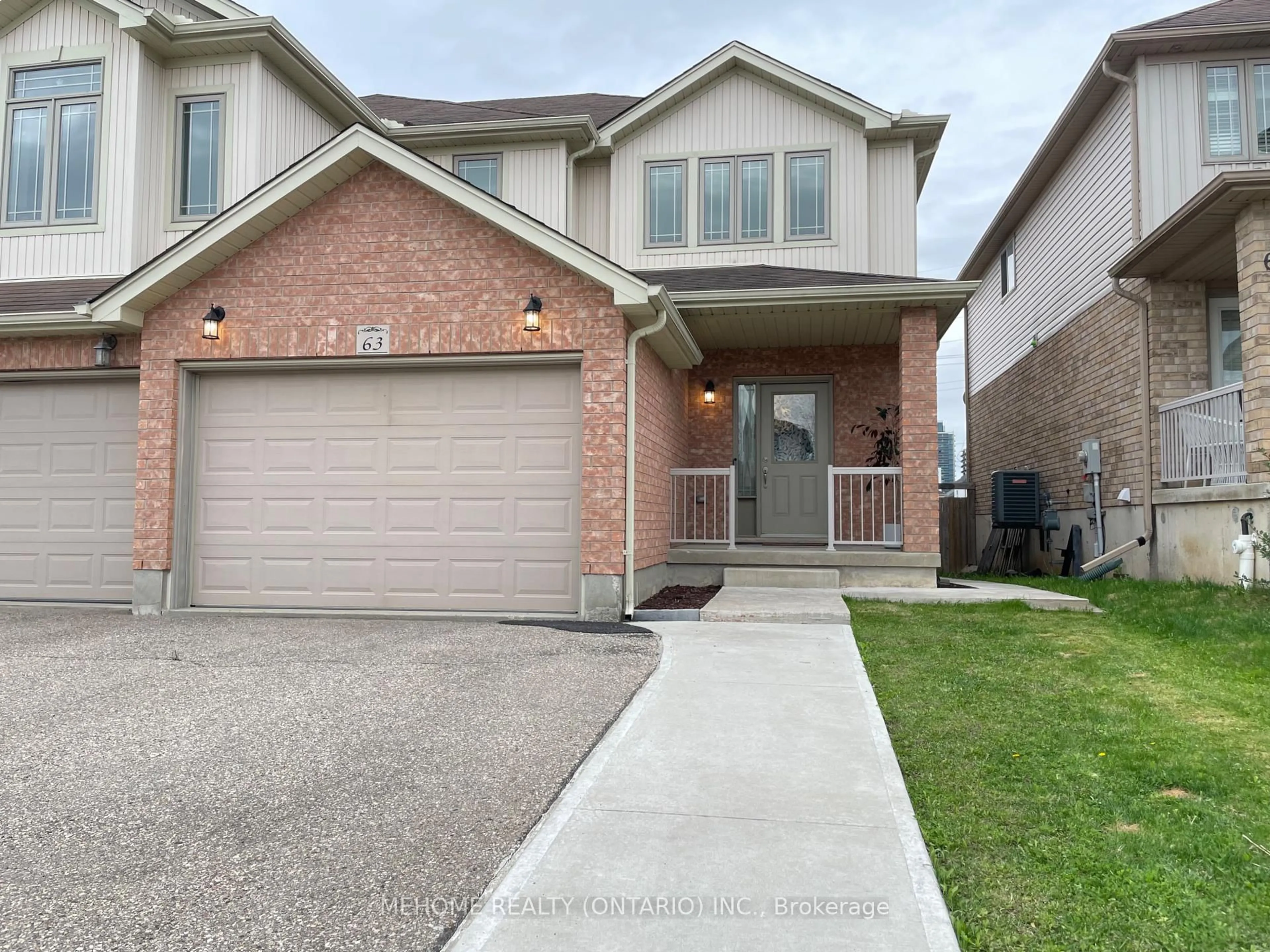 Home with brick exterior material, street for 63 Huck Cres, Kitchener Ontario N2N 0A4