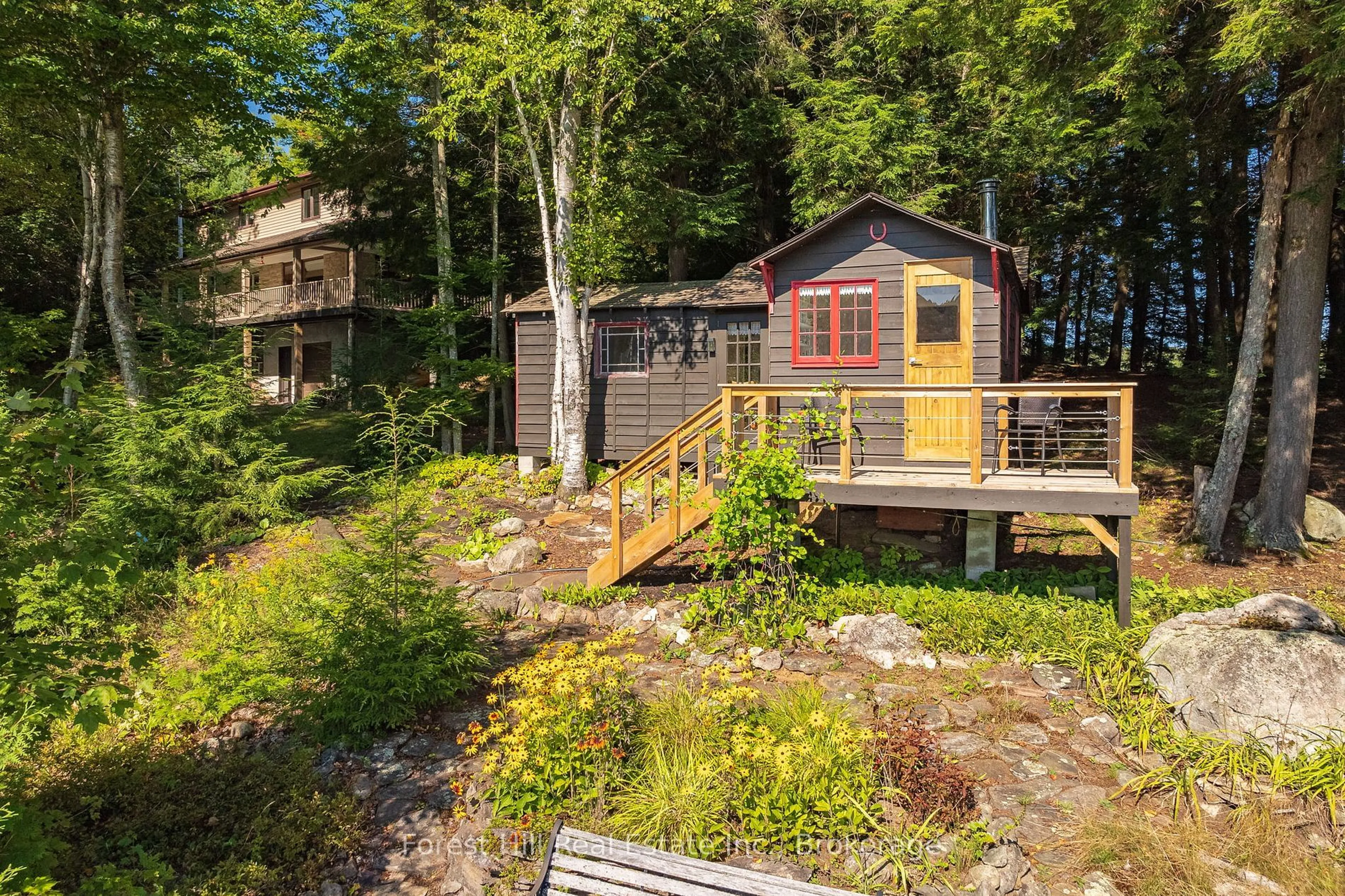 A pic from outside/outdoor area/front of a property/back of a property/a pic from drone, water/lake/river/ocean view for 1089 Lutes Lane, Algonquin Highlands Ontario P0A 1E0